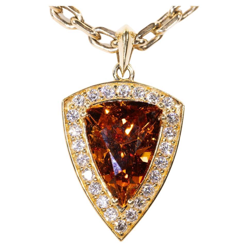 3.52 Carat Hessonite Garnet Pendant with Diamond Halo set in 18K Yellow Gold For Sale