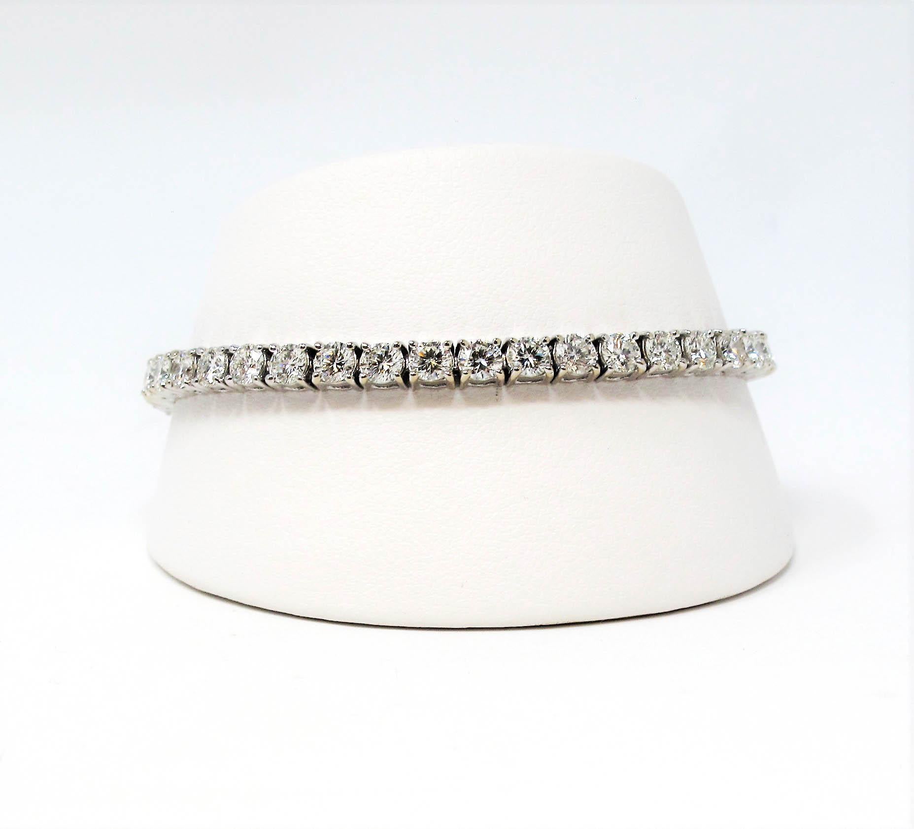 This is an absolutely stunning diamond tennis bracelet that will stand the test of time. The elegant white gold setting paired with the timeless round diamonds makes this piece a true classic that will never go out of style. 
   
This gorgeous