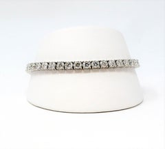 Bracelet tennis en or blanc 14 carats avec diamants brillants ronds de 8,54 carats au total