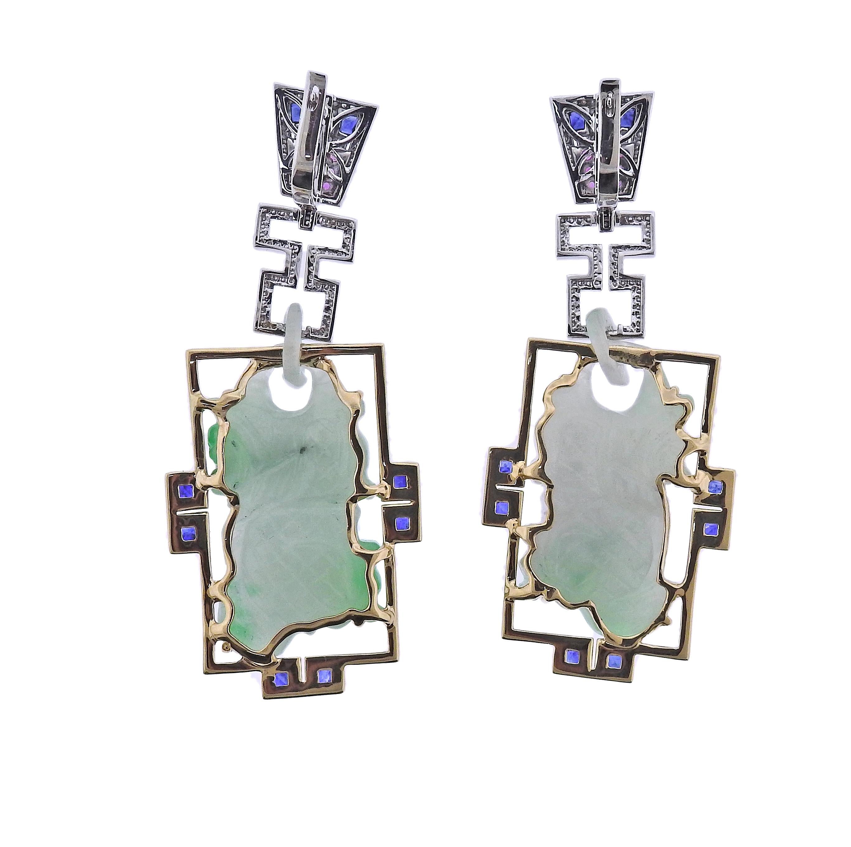 Pair of long 14k gold drop earrings, with 85.42ctw carved jadeite jade, pink and blue sapphires and 0.43ctw diamonds. Earrings are 70mm x 28mm. Marked 585. Weight - 35.8 grams.