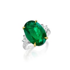 8.54ct Oval Emerald with Brilliant Trapezoid and Round Diamond Ring