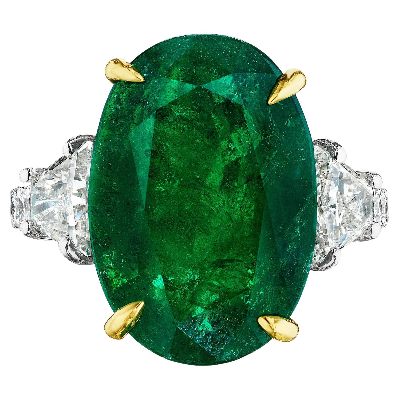 8.54ct Oval Emerald with Brilliant Trapezoid and Round Diamond Ring For Sale
