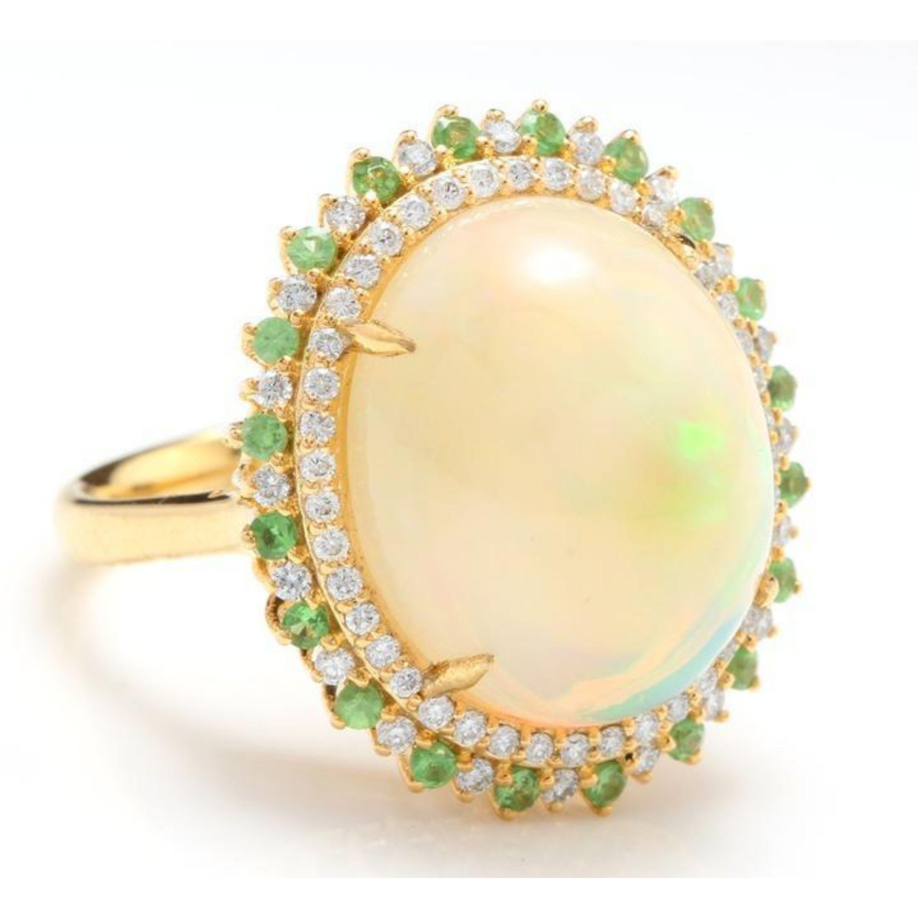 8.55 Carats Natural Impressive Ethiopian Opal, Tsavorite and Diamond 14K Solid Yellow Gold Ring

The opal has beautiful fire, pictures don't show the whole beauty of the opal!

Total Natural Opal Weight is: Approx. 8.15 Carats

Opal Measures:
