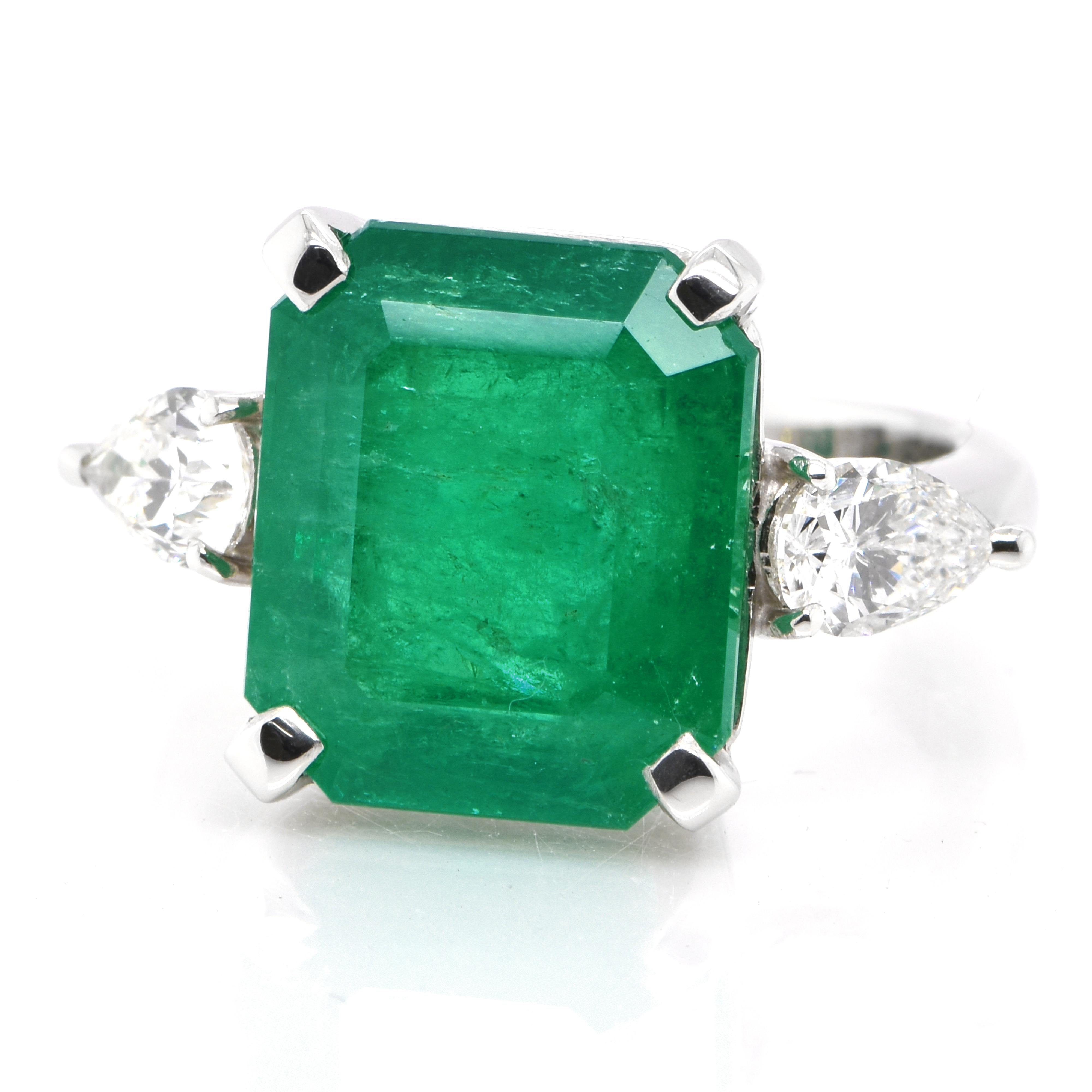 A stunning ring featuring a 8.56 Carat Natural Colombian Emerald and 1.039 Carats of Diamond Accents set in Platinum. People have admired emerald’s green for thousands of years. Emeralds have always been associated with the lushest landscapes and
