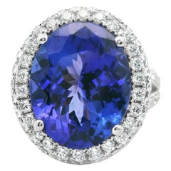 8.56 Carat Tanzanite Oval brilliant Cut Pavé Diamond Halo Solitaire Ring