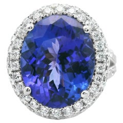 8.56 Carat Tanzanite Oval brilliant Cut Pavé Diamond Halo Solitaire Ring
