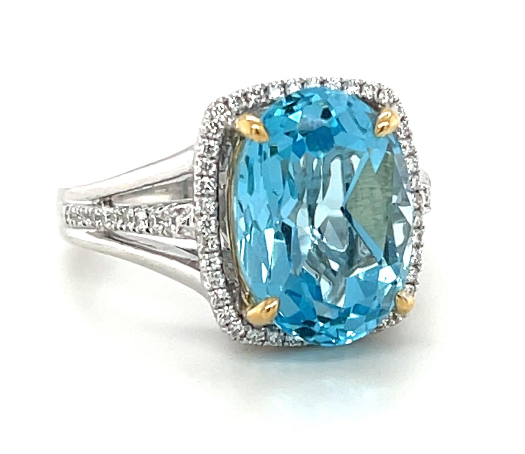 Artisan 8.59 Carat Blue Topaz and Diamond Halo Cocktail Ring in White and Yellow Gold For Sale