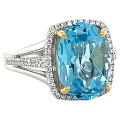 8.59 Carat Blue Topaz and Diamond Halo Cocktail Ring in White and Yellow Gold