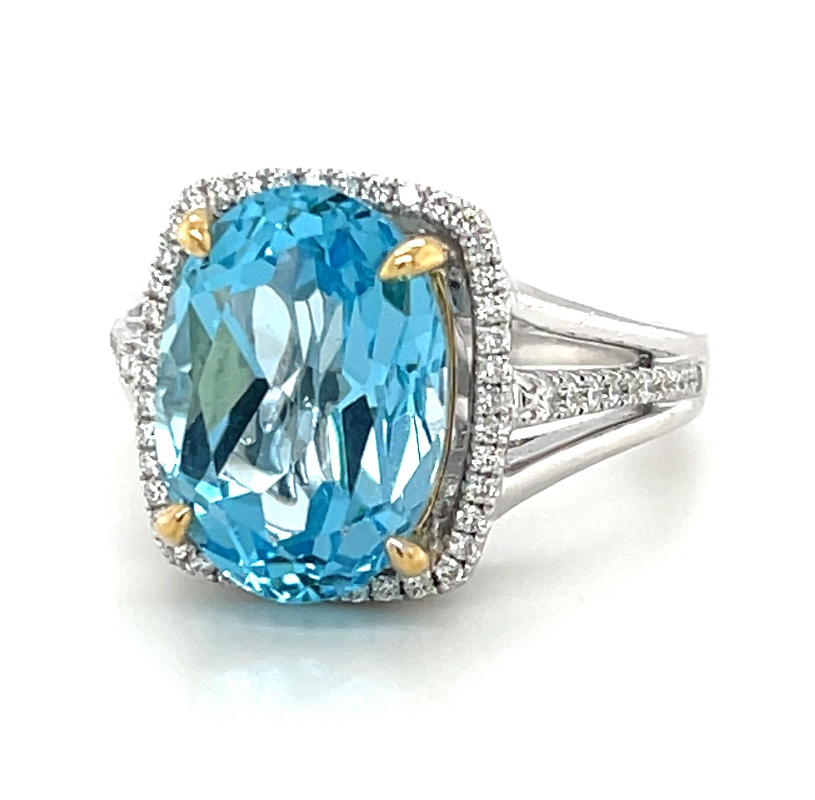 Women's 8.59 Carat Blue Topaz and Diamond Halo Cocktail Ring in White and Yellow Gold For Sale