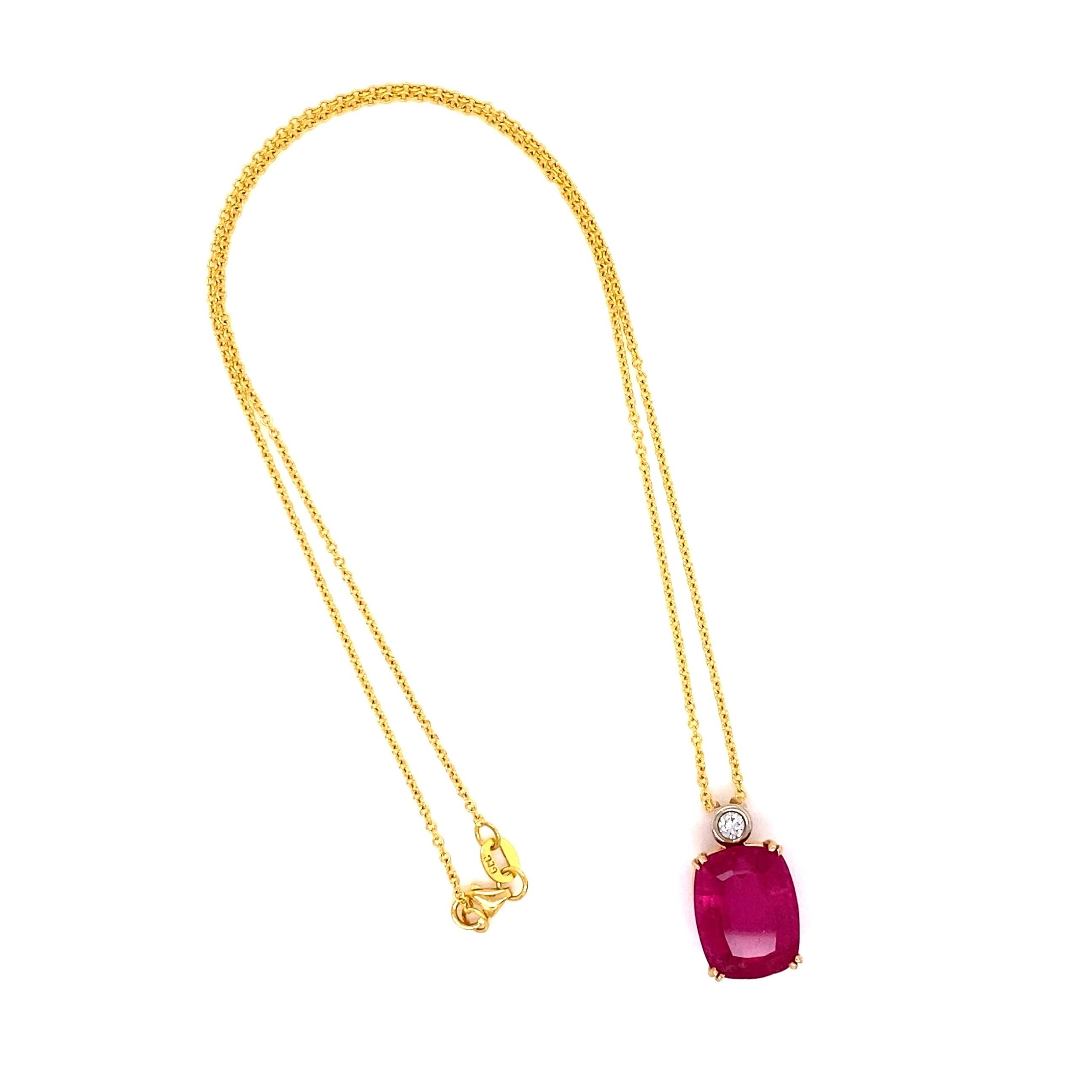 Beautiful Rubelite Tourmaline and Diamond Pendant Necklace, centering a securely set Cushion Rubelite Tourmaline, weighing approx. 8.59 Carat, accented by a Diamond, approx. 0.12 Carat. Dimensions: 0.33