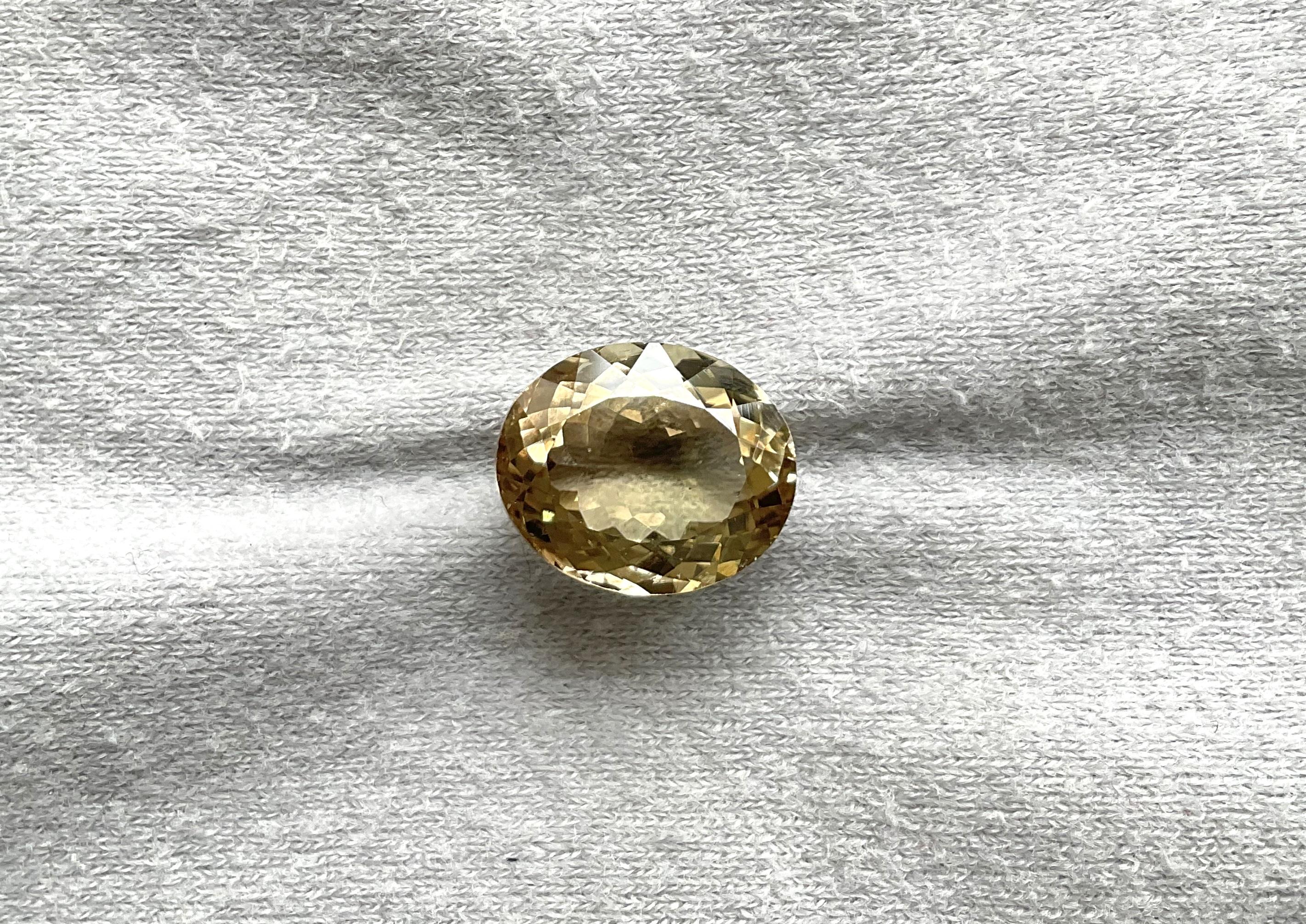 Women's or Men's 8.59 Carats Yellow Tourmaline Oval Faceted cut stone Fine Jewelry Natural Gem For Sale