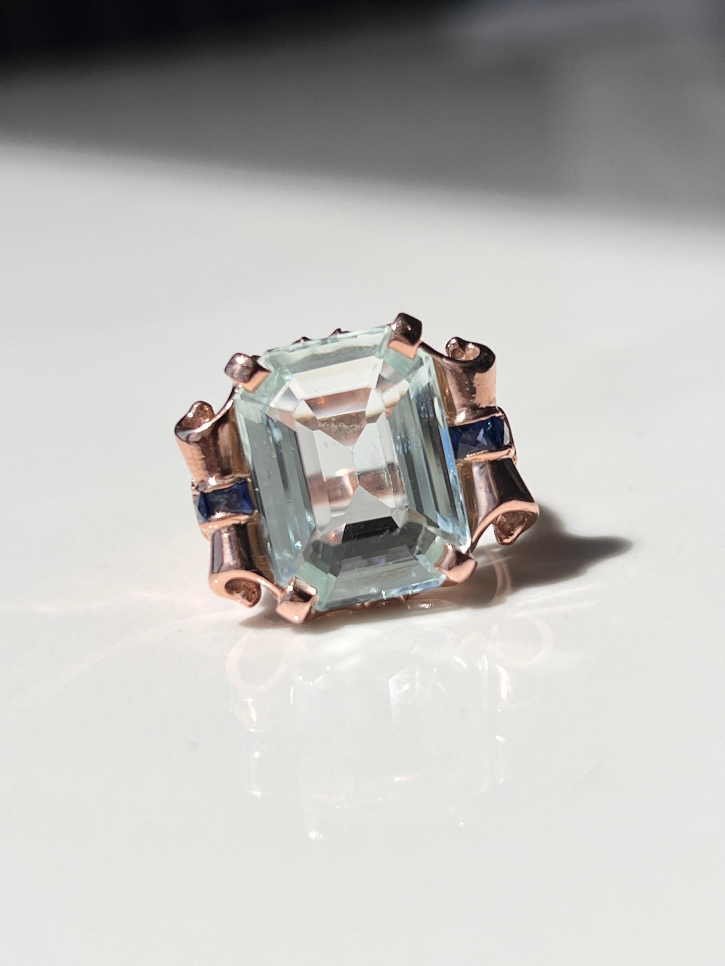 This exquisite vintage victorian style aquamarine ring, features a stunning natural pale blue aquamarine gemstone accompanied with natural sapphires in an intricately detailed scroll design.

This timeless piece exudes elegance and charm, making it