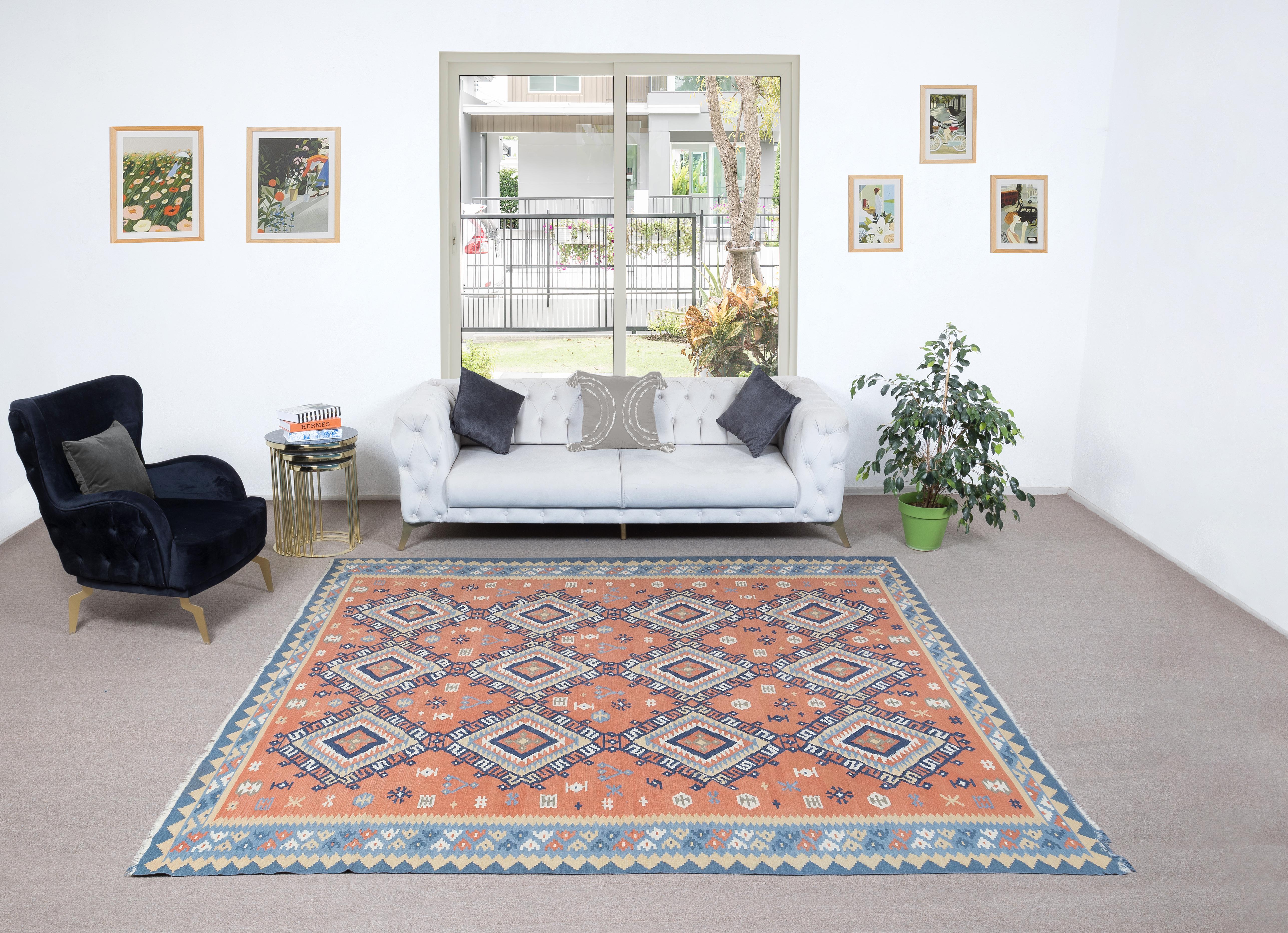 Transport yourself to the serene landscapes of Sweden with this exquisite vintage handwoven Swedish wool kilim flatweave, a testament to the timeless artistry of Scandinavian craftsmanship. Skillfully crafted with meticulous attention to detail,