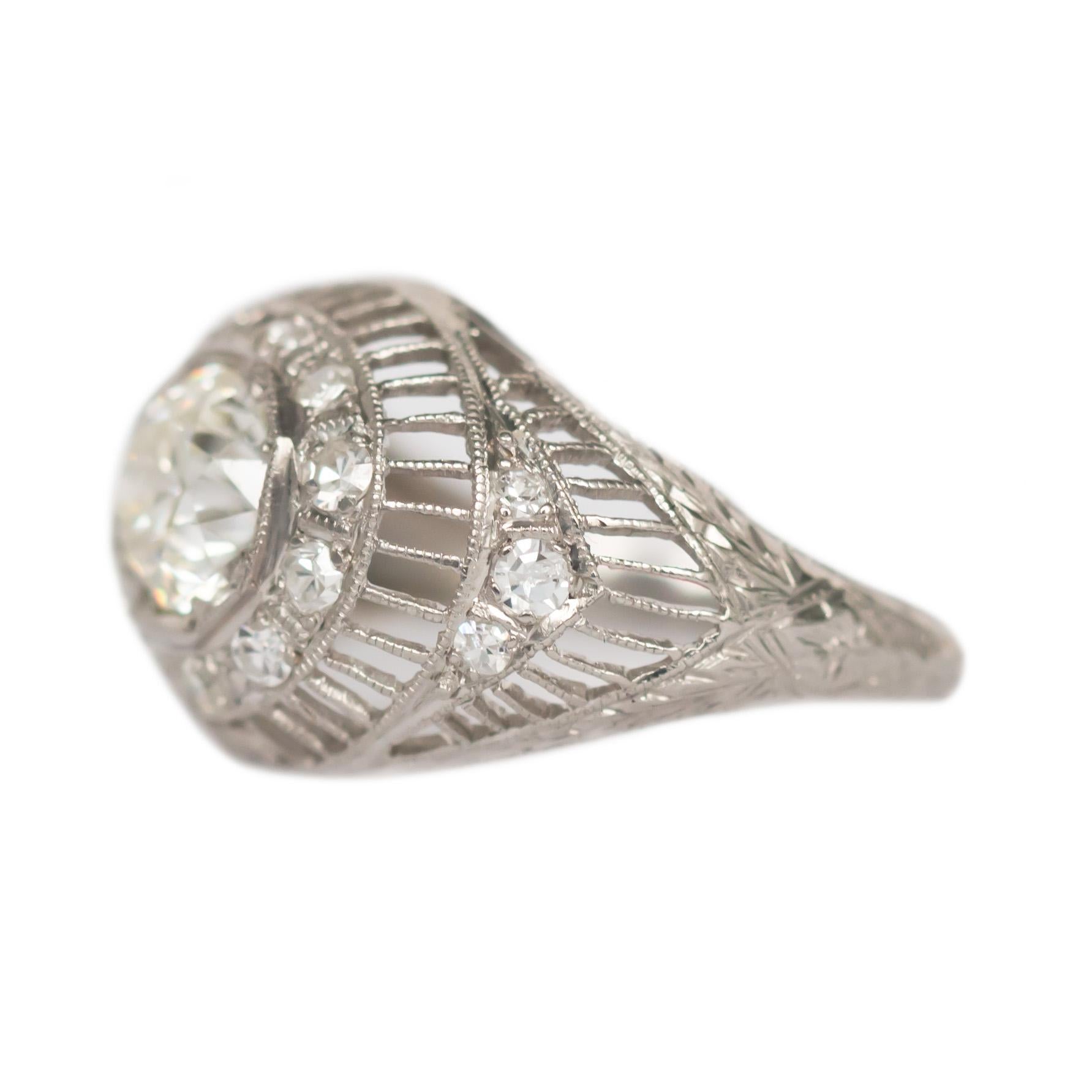 Ring Size: 5.95
Metal Type: Platinum [Hallmarked, and Tested]
Weight: 3.2 grams

Center Diamond Details:
Weight: .86 carat
Cut: Old European Brilliant
Color: J
Clarity: VS1

Side Diamond Details:
Weight: .20 carat, total weight
Cut: Old European