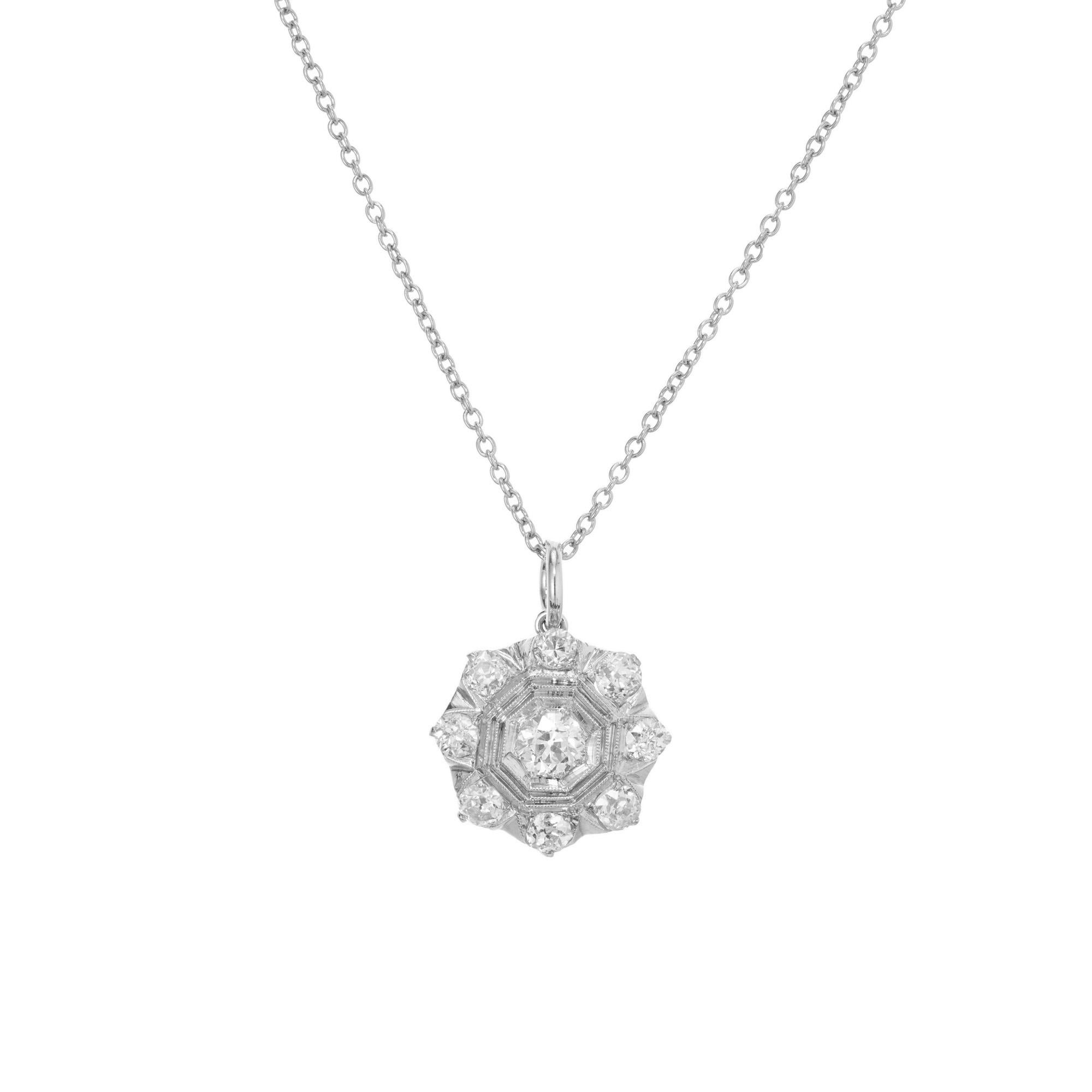 Victorian diamond compass style pendant necklace. This beautiful pendant starts with one Old European cut center diamond framed by a triple octagon with a halo of eight Old mine cut diamonds. The chain measures 16 inches in length. Circa