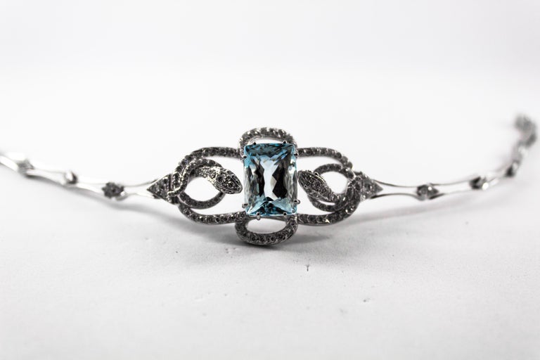 Bracelet « Serpents » en or blanc avec aiguemarine de 8,60 carats et