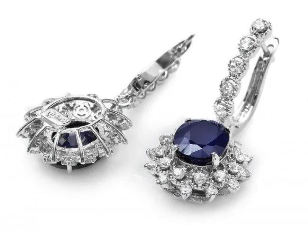 8.60 Carats Natural Sapphire and Diamond 14K Solid White Gold Earrings

Total Natural Sapphire Weight: Approx. 6.90 Carats

Sapphire Treatment: Diffusion

Sapphire Measure: Approx. 10 x 8 mm 

Total Natural Round Diamonds Weight: Approx. 1.70 Carats