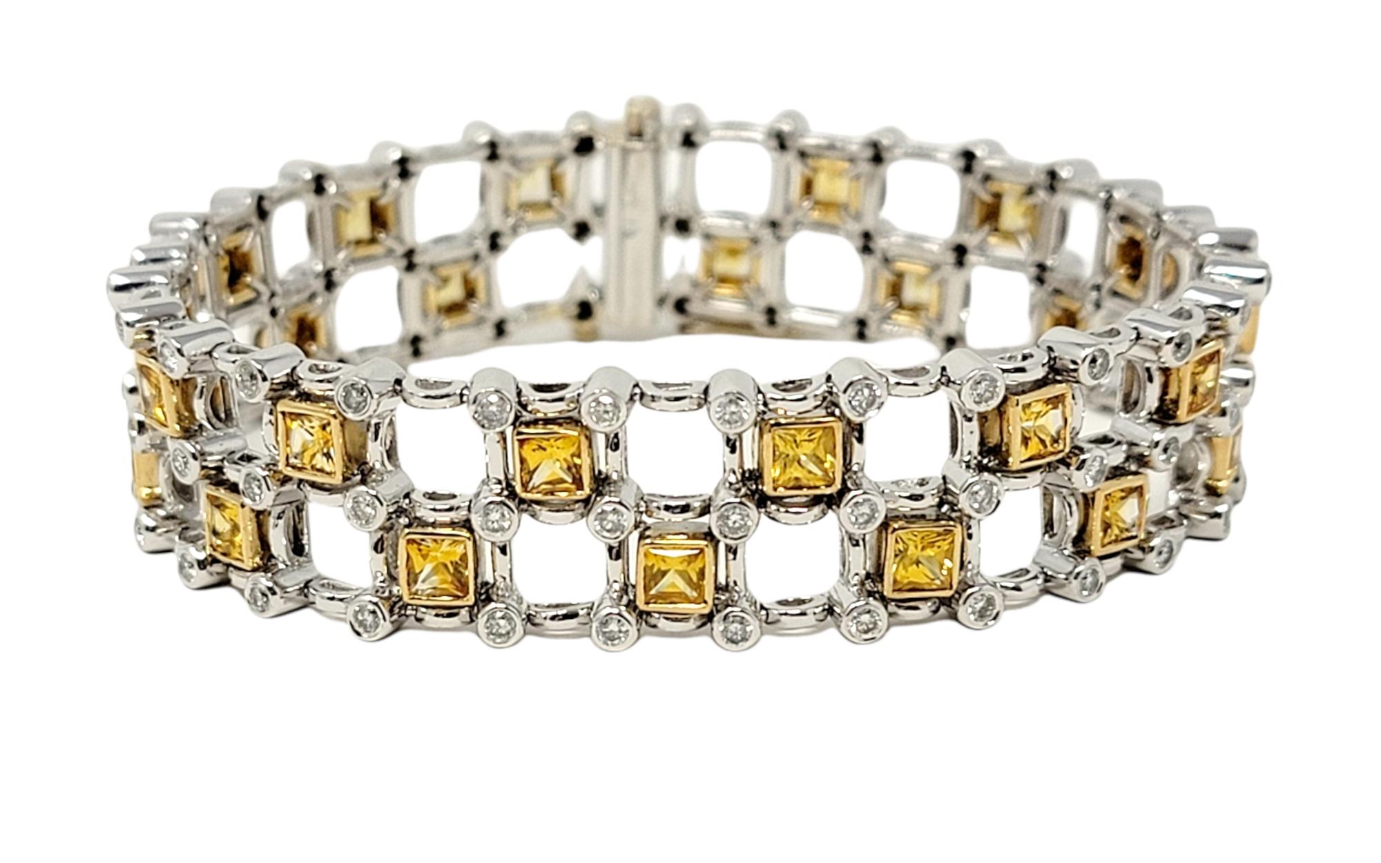 This gorgeous contemporary diamond and sapphire link bracelet will surround your wrist with modern luxury.  This colorful and sparkling piece features square shaped yellow sapphire stones bezel set in yellow gold in an alternating pattern throughout