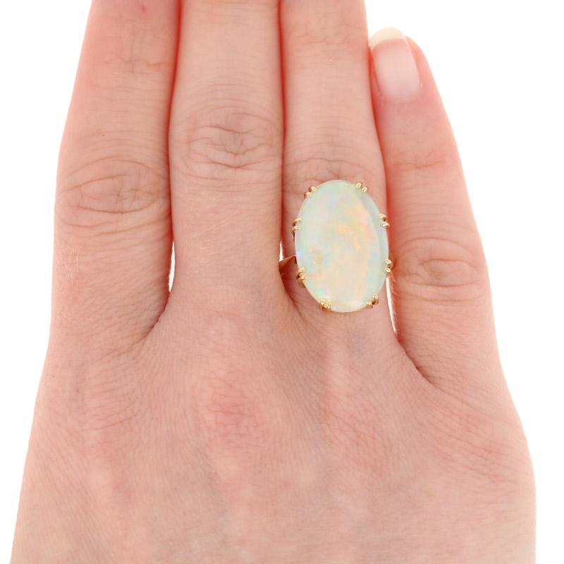Women's 8.60 Carat Oval Cabochon Cut Opal Ring, 18 Karat Yellow Gold Cocktail Solitaire