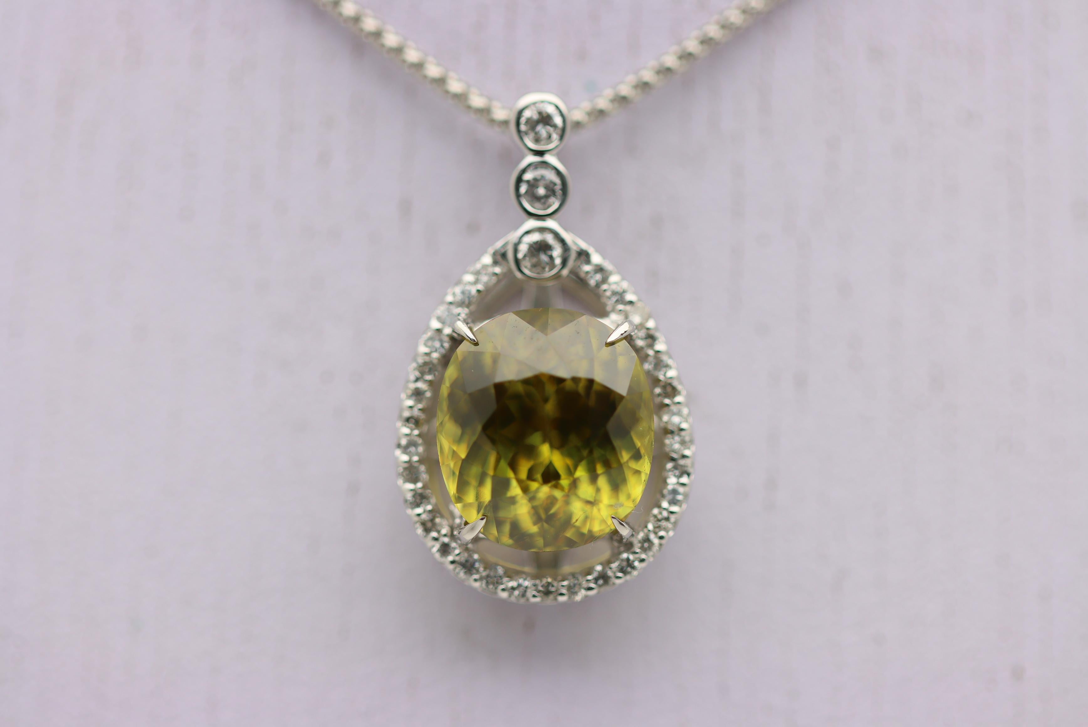 A superb example of a gem quality sphene weighing an impressive 8.61 carats. Sphene is known for its high refractive index and amazing levels of fire. The gem displays a stunning array of color flashes due to its refractive index which is higher