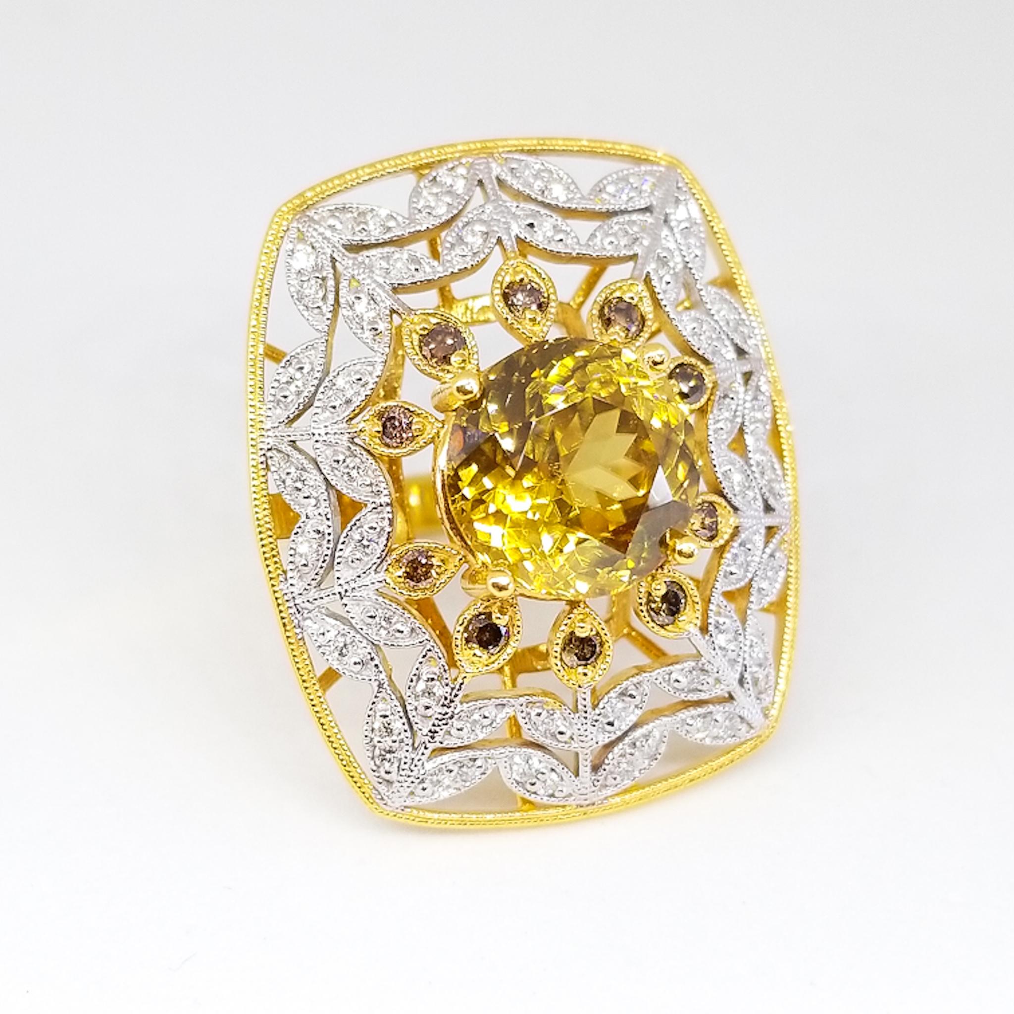 A 7.83 Carat Natural Fancy Zircon of Cognac / Champagne Color, Gem Clarity and Exceptional Cutting is the centerpiece of this magnificently large cocktail ring. The brilliant cut center stone of 11.07mm diameter by 6.84mm depth is prong set and is