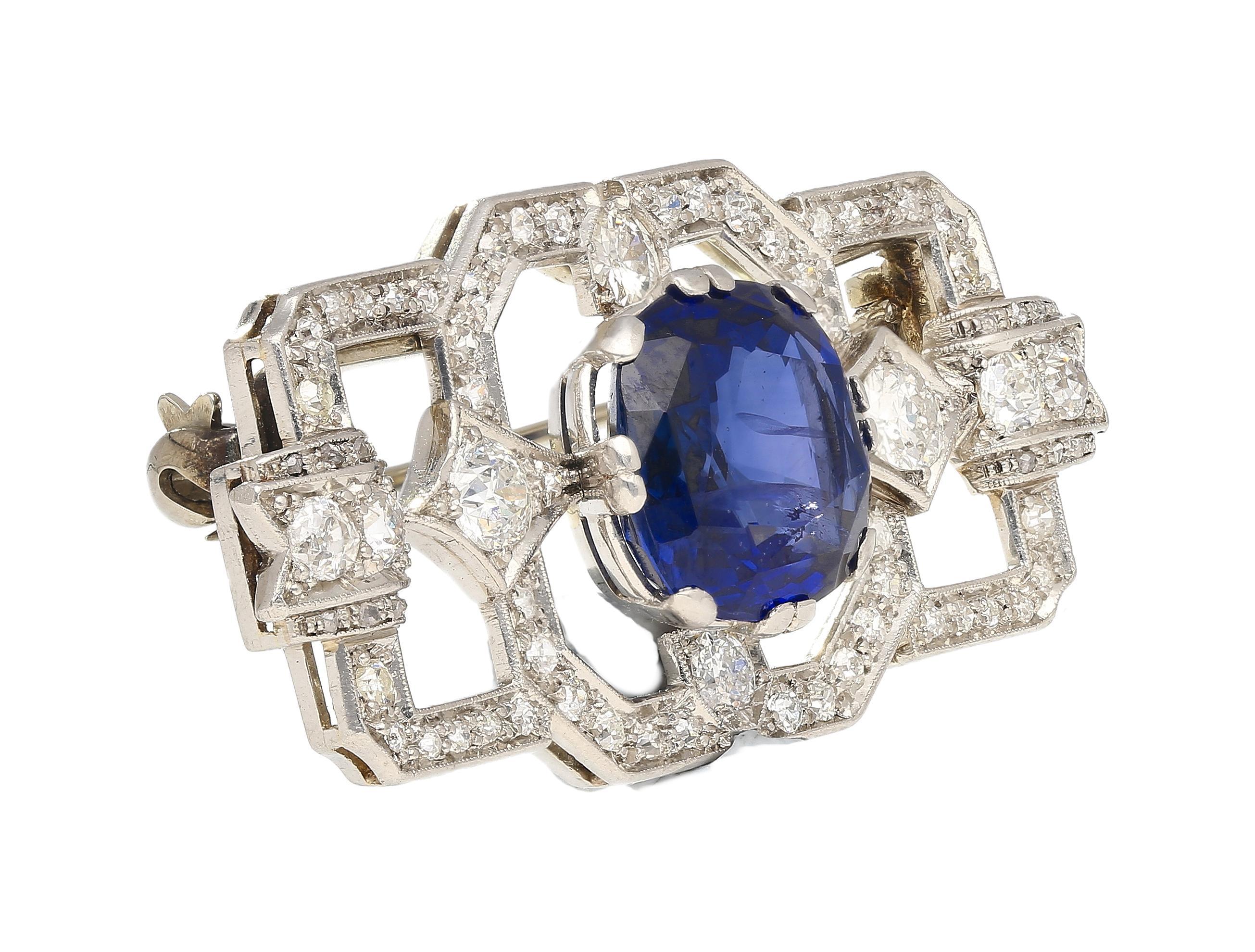 Jewelry Details:
Item Type: Brooch Pin
Metal Type: Platinum
Weight: 12.45 grams
Era: Art Deco

Center Stone Details:
Gemstone Type: Sapphire
Carat: 8.64 Carats
Cut: Cushion Cut
Color: Blue
Treatment: No Heat
Origin: Ceylon (Sri Lanka)
Certification: