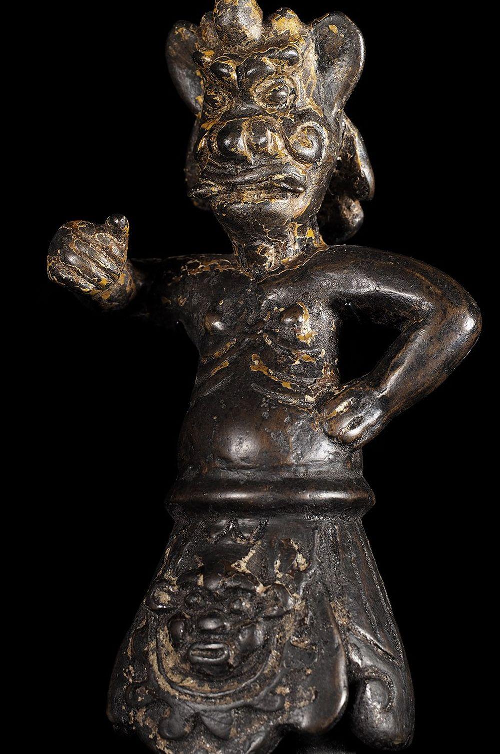 Early Chinese guardian figure. Hard to date because it is so unique, but based on the casting and overall look it appears to be at least 15thC or and possibly much earlier. Lots of personality in this delightful fellow. This piece stands proudly at