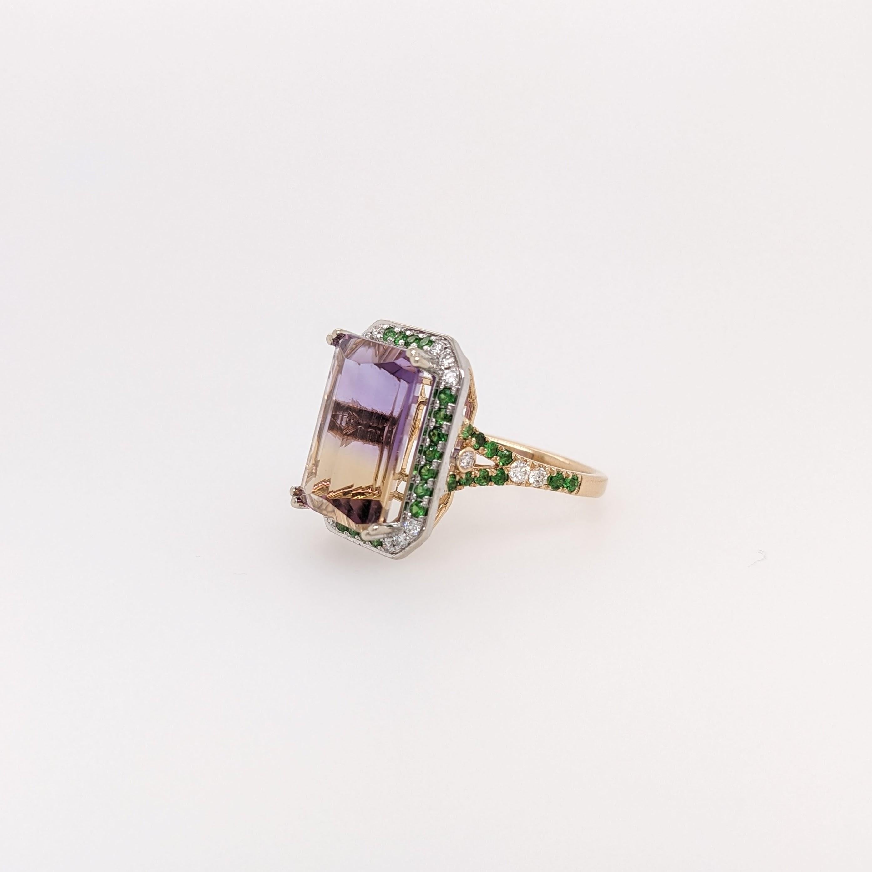One of a kind colorful statement ring featuring a gorgeous barrel cut Ametrine in a dual tone 14k gold setting with green tsavorite garnet and natural diamond accents. This ring make a great statement piece!

~~~~~

Specifications:

Item Type: