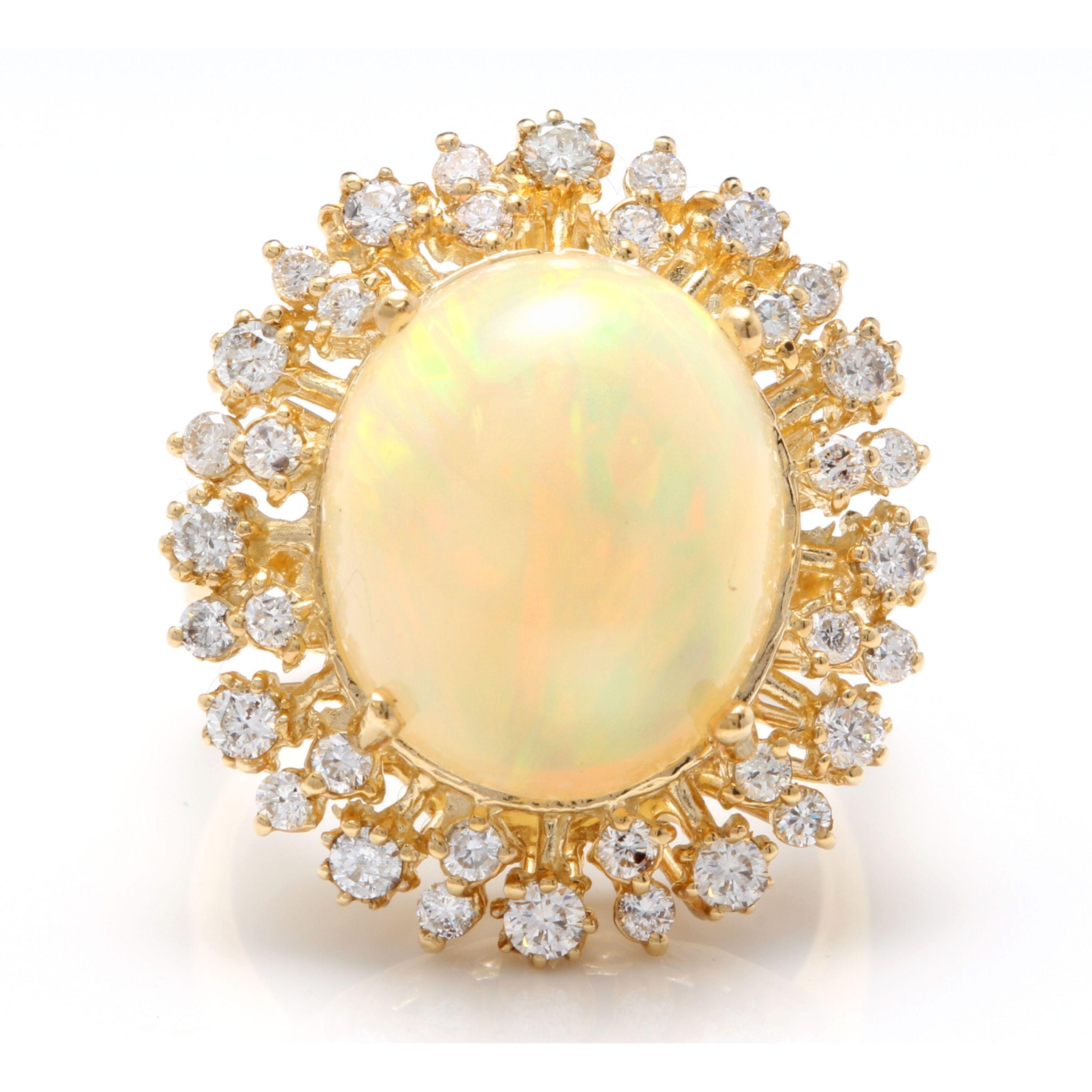 8.65 Carats Natural Impressive Ethiopian Opal and Diamond 14K Solid Yellow Gold Ring

Total Natural Opal Weight is: Approx. 7.35 Carats

Opal Measures: Approx. 15.00 x 12.50mm

The head of the ring measures: Approx. 24.00 x 21.00mm

Total Natural