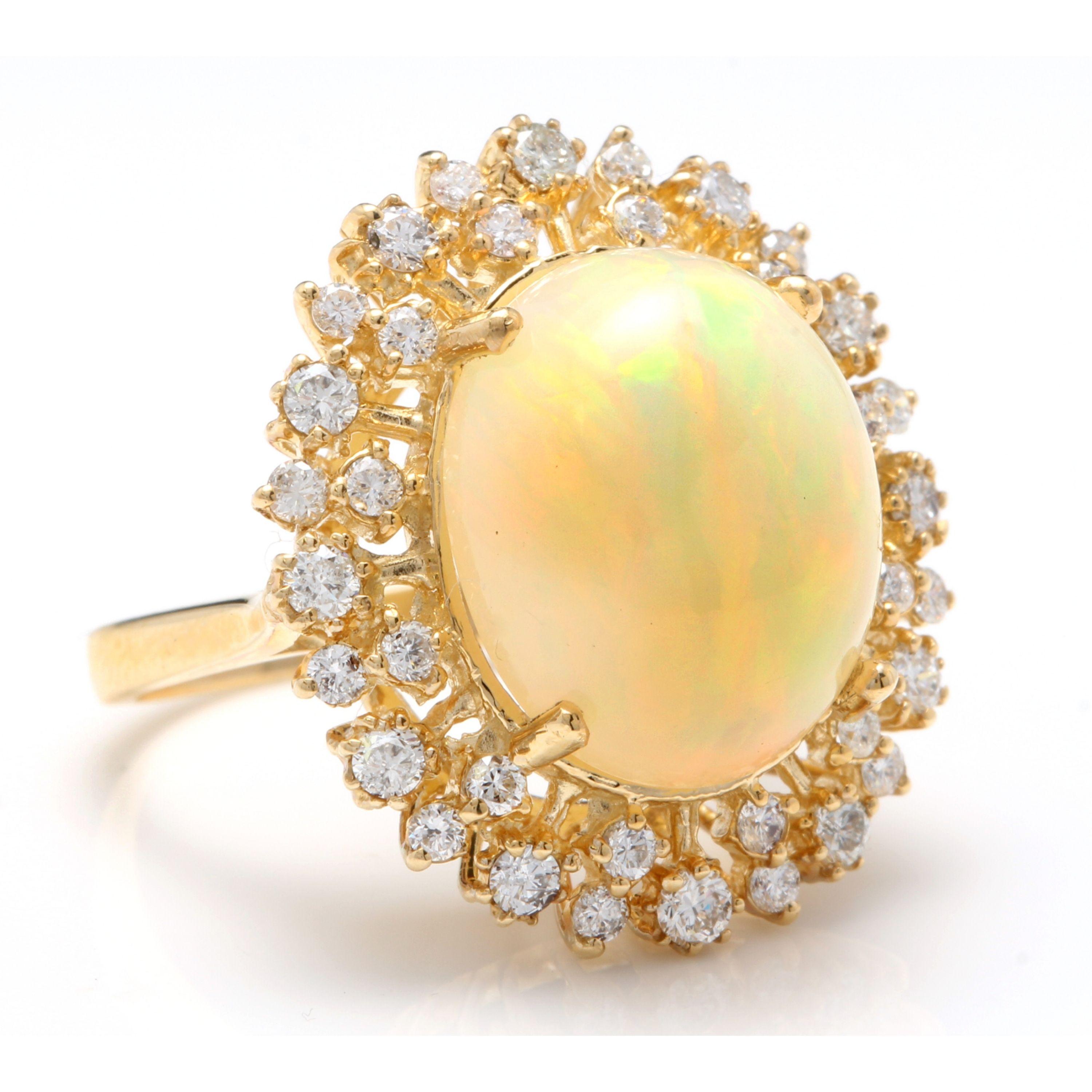 Mixed Cut 8.65 Carat Natural Impressive Ethiopian Opal and Diamond 14K Solid Gold Ring For Sale