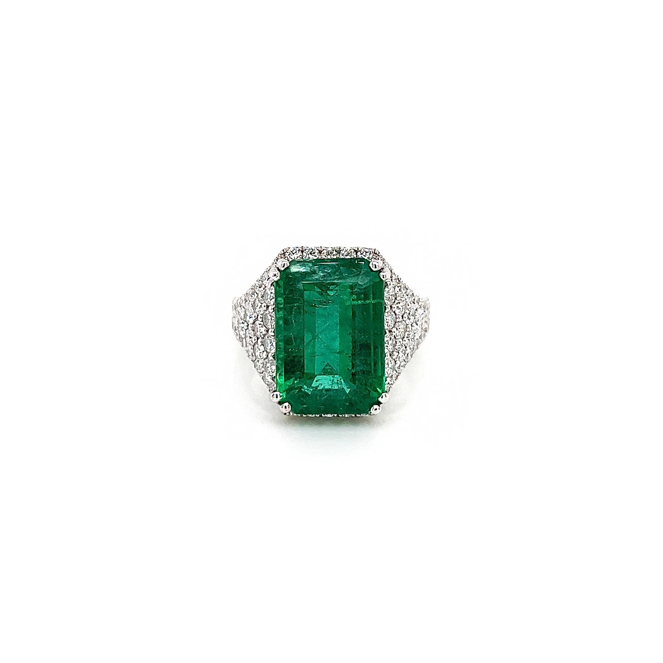 8.65 Total Carat Emerald and Diamond Pave-Set Ladies Ring. GIA Certified.

This unique Emerald Diamond Ring is made in 18K White Gold and has GIA certified 7.04ct Green Emerald in center and 19 Round Diamonds in total of 1.61cts. 

This amazing ring