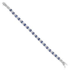 Armband aus 18-karätigem Weißgold mit einem blauen Saphir von 8,66 Karat und einem Diamanten von 3,45 Karat (SI/H)