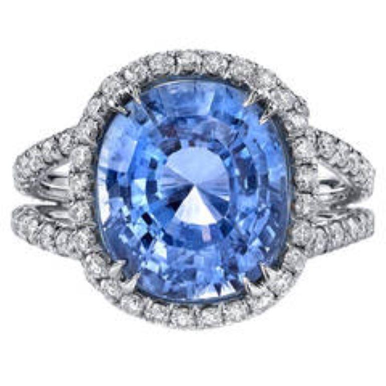 This unique and intricate ring is a true work of art that is sure to catch the eye. The centerpiece is an 8.66ct. GIA Certified Sapphire, set in luxurious 18 Karat White Gold and adorned with 1.60ct of sparkling white diamonds. The word 