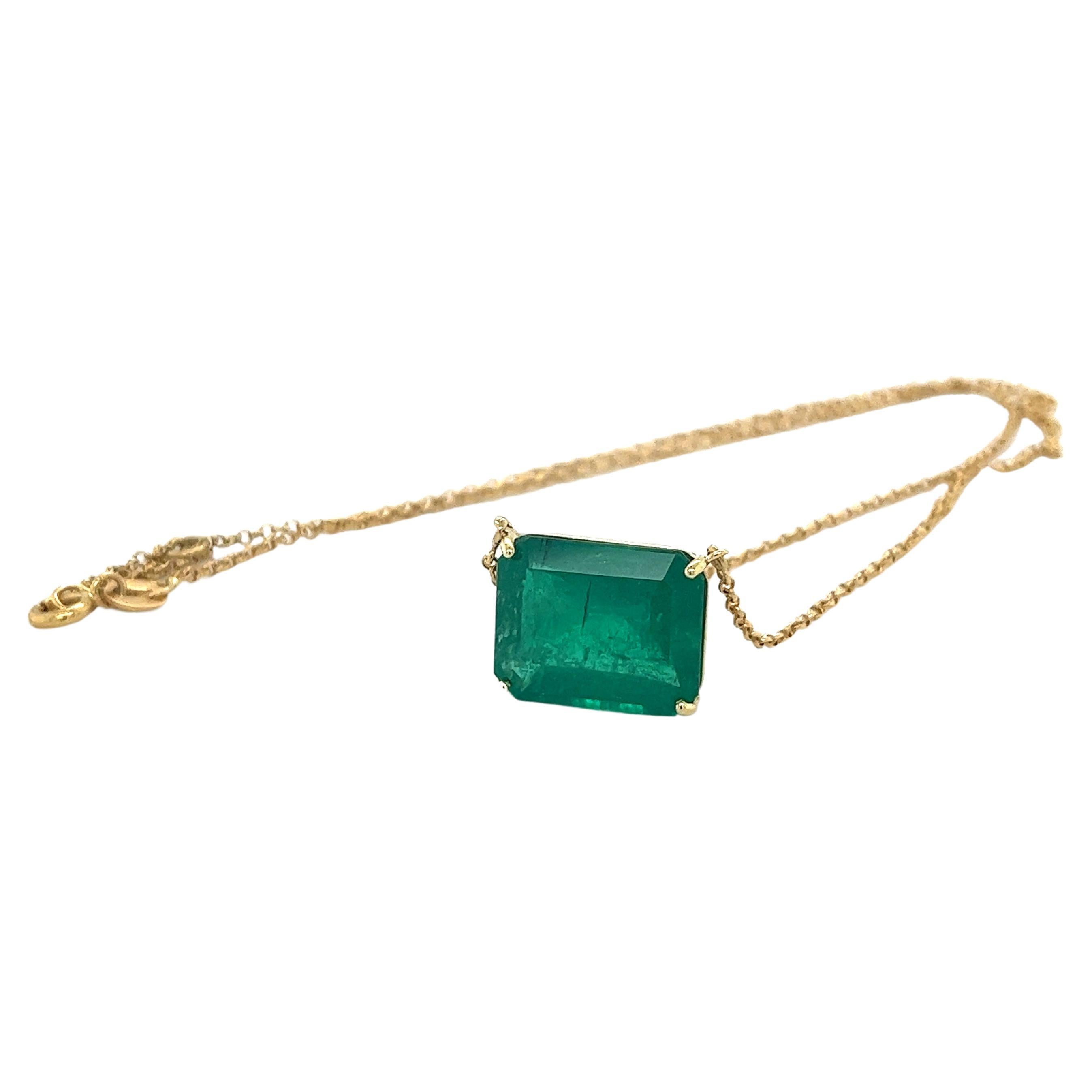 Introducing this Vivid Green Colombian Emerald connecting choker necklace set in 18k solid yellow gold. The pendant seamlessly integrates with the cable chain in what's known as a 'floating' solitaire pendant necklace. The chain necklace features 2