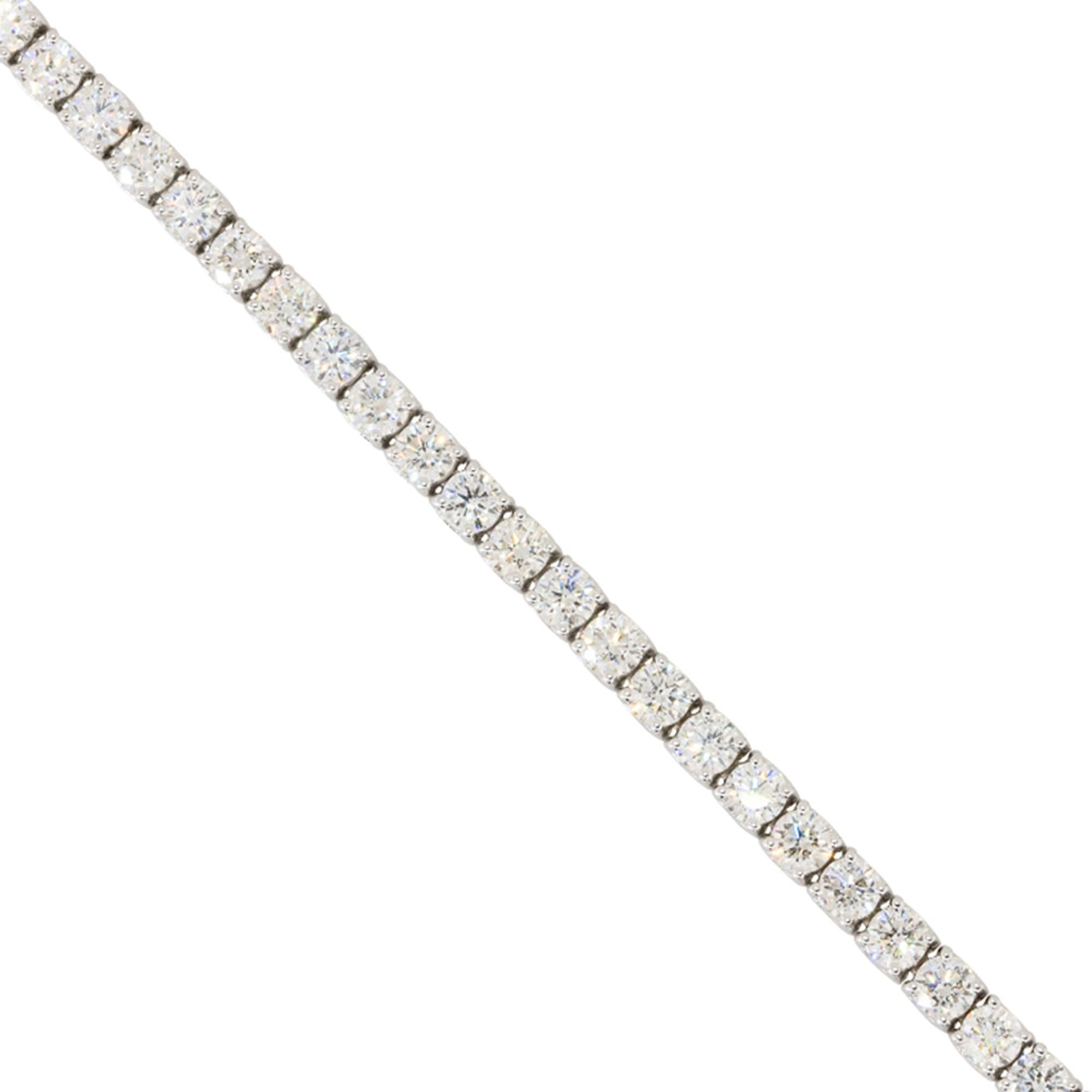Material: 14k White gold
Diamond Details: Approx. 8.69ctw of round cut Diamonds. Diamonds are G/H in color and VS in clarity. 46 stones in total
Clasps: Tongue in box clasp
Total Weight: 13.2g (8.5dwt)
Length: 7