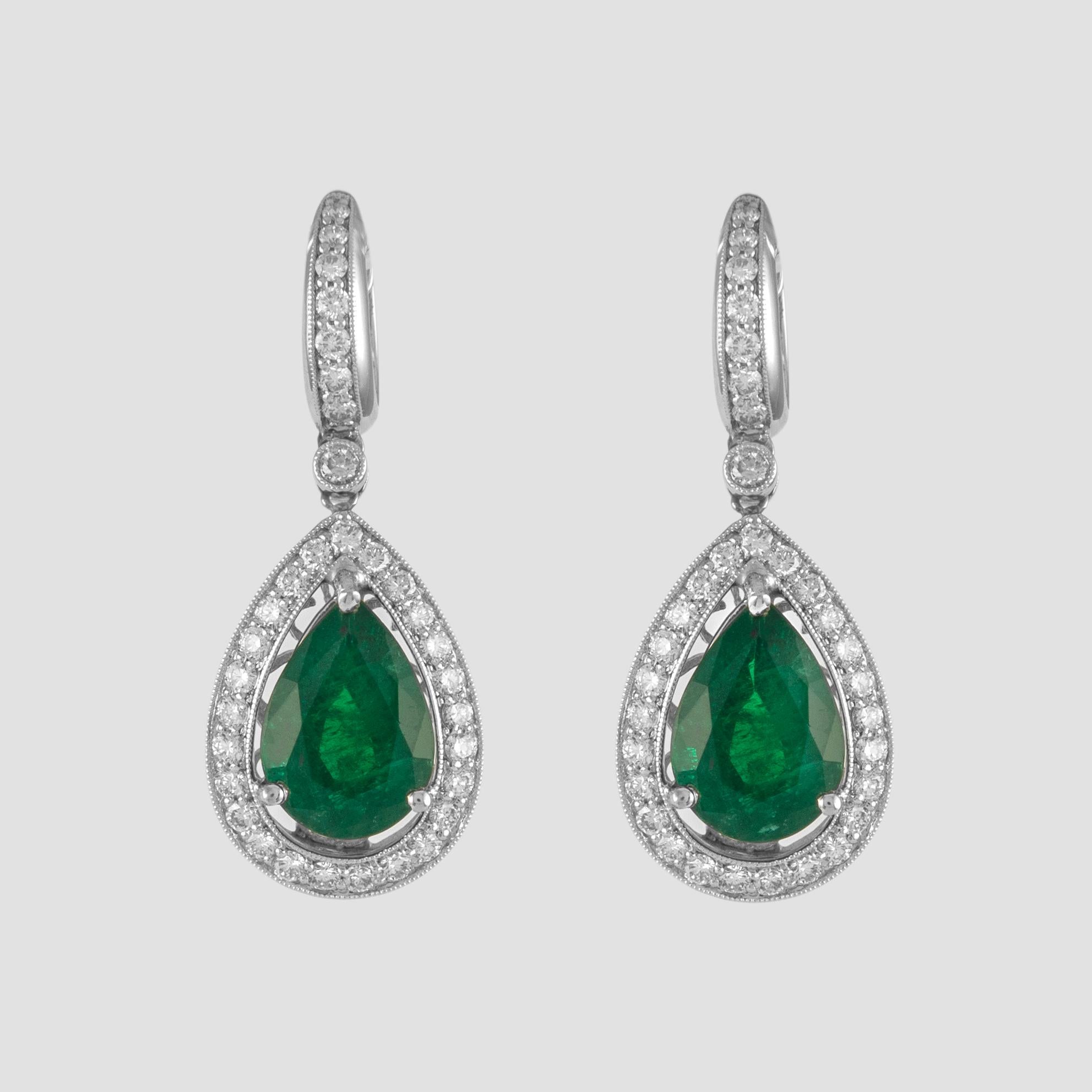 Contemporary 8.69ct Pear Emeralds with Diamonds Drop Earrings 18k White Gold For Sale