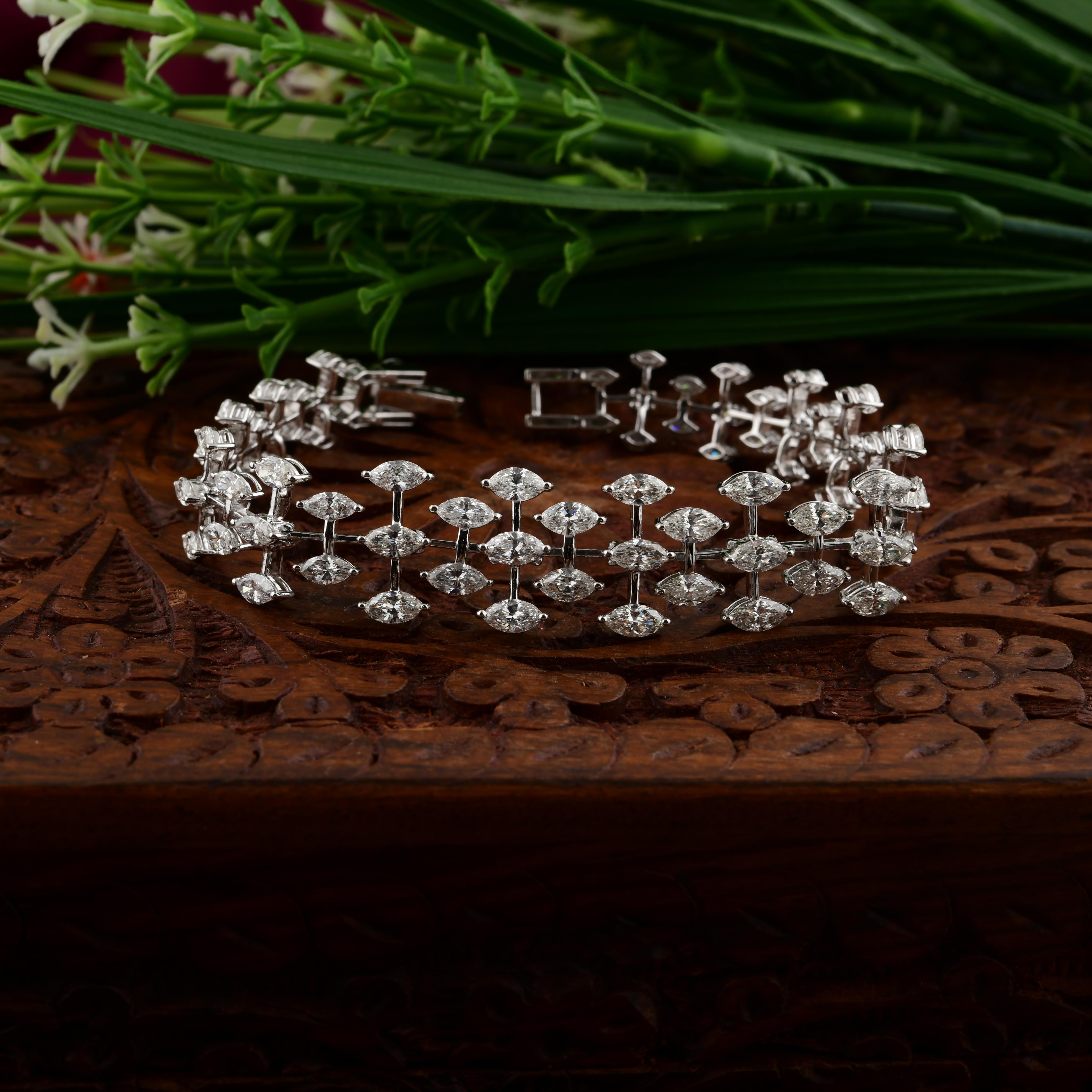 8.69Ct SI/HI Marquise Diamond Wide Bracelet 14K White Gold All Tariffs Paid
Crafted in 14K white gold, it features a delicate double row of diamond-encrusted leaf motifs, each shaped with precision and adorned with hand-set marquise brilliant