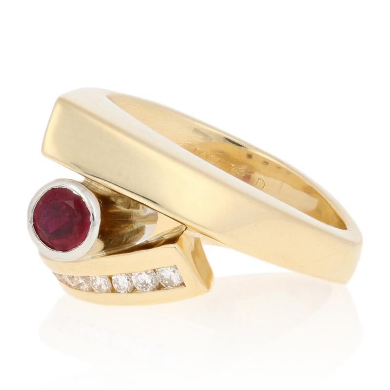 This exquisite work of wearable art is destined to become a favorite addition to your jewelry collection! Exhibiting skilled craftsmanship and a thoughtful composition, this 18k yellow gold bypass ring hosts a sparkling array of diamond accents