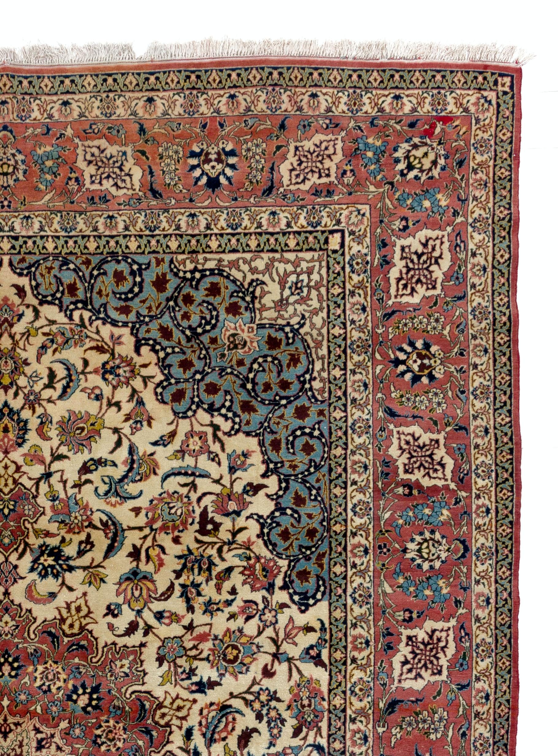 This elegant rug features an ivory field richly decorated with scrolling floral vines centered by a cusped brick red/brown medallion flanked at each end with large palmettes enclosed by sky blue spandrels with a large border of palmettes and