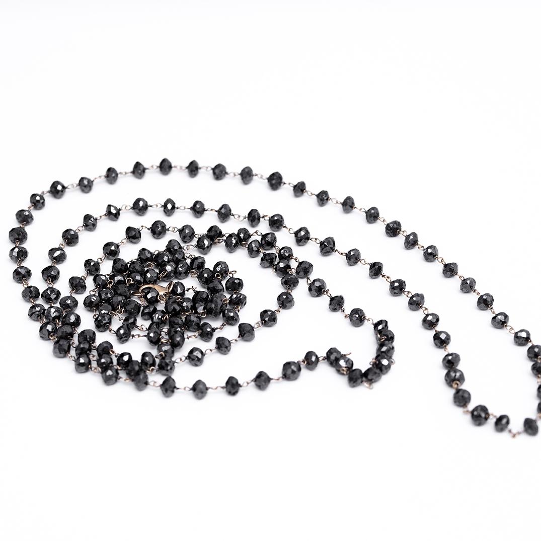 Contemporary 87 Carat Black Diamond Bead Long Gold Chain Necklace For Sale