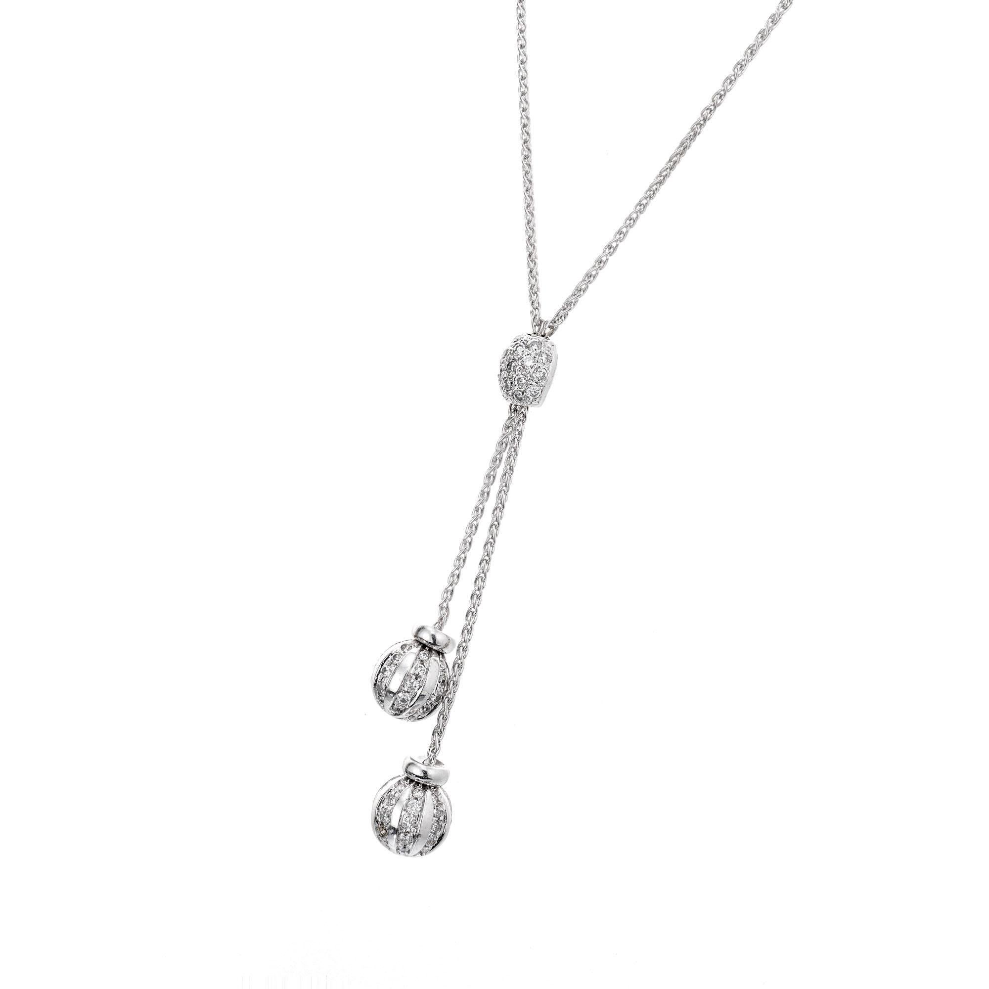 Pave Diamond ball “Y” necklace in 14k white gold with 87 full cut round diamonds. Length 20 inches. 

14k white gold
87 round full cut Diamonds, approx. total weight .87cts, H, SI
10.6 grams
10.6 grams
Length: 20 inches – Width: 1.31mm – Depth: