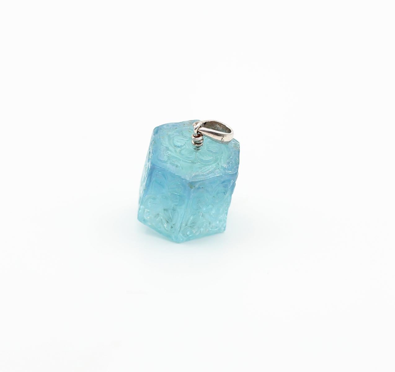 Flower Carved Aquamarine Pendant, 1980
A massive 87 Carats carved stone.
Flower Carved Aquamarine Pendant, created around 1980. A truly massive and fine carved Aquamarine stone pendant. This pendant gives freedom of choosing the outfit style. It can