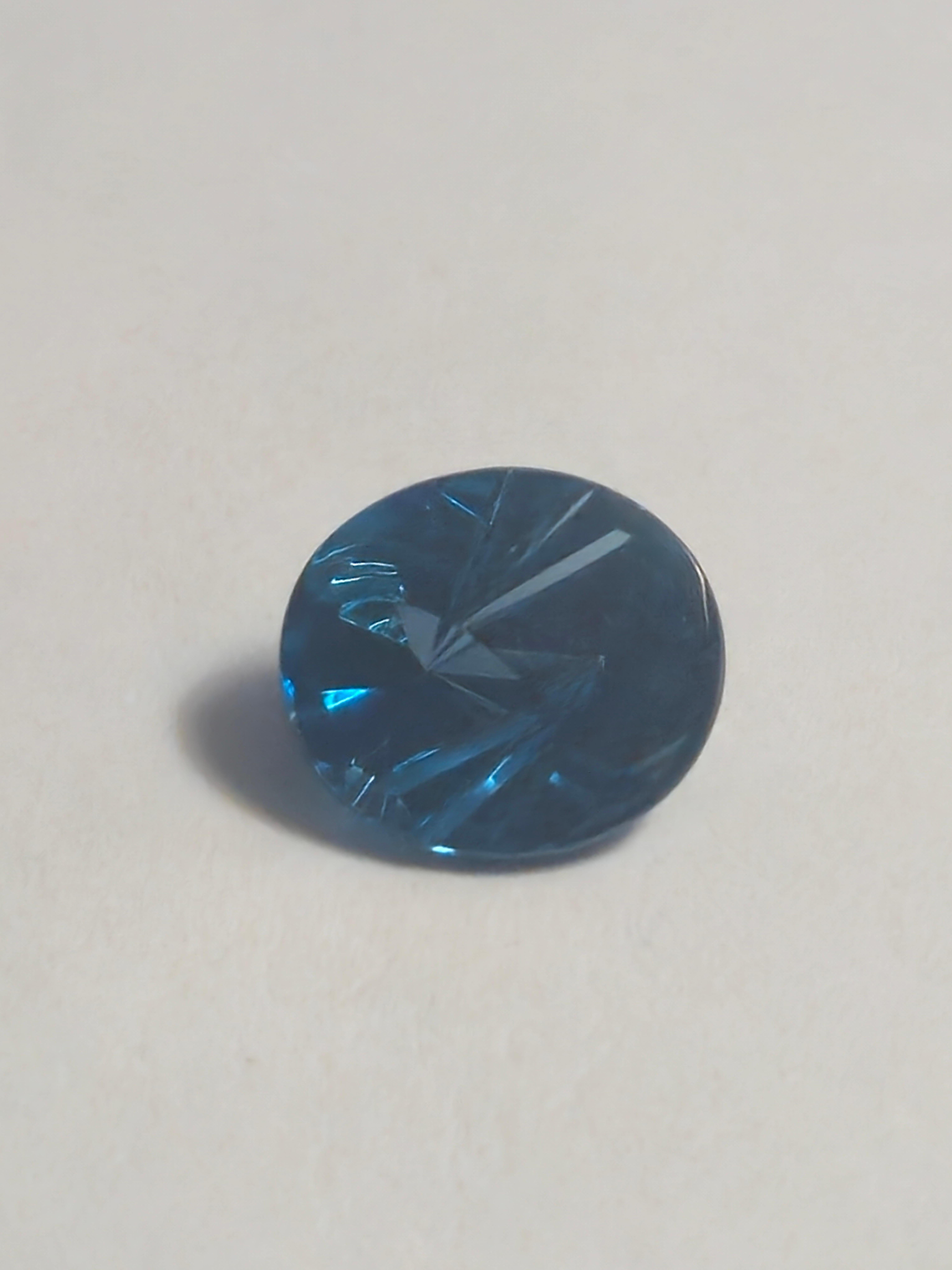Taglio ovale 8.7 ct Oval London Blue Topaz 14X12 Fantasy Cut in vendita