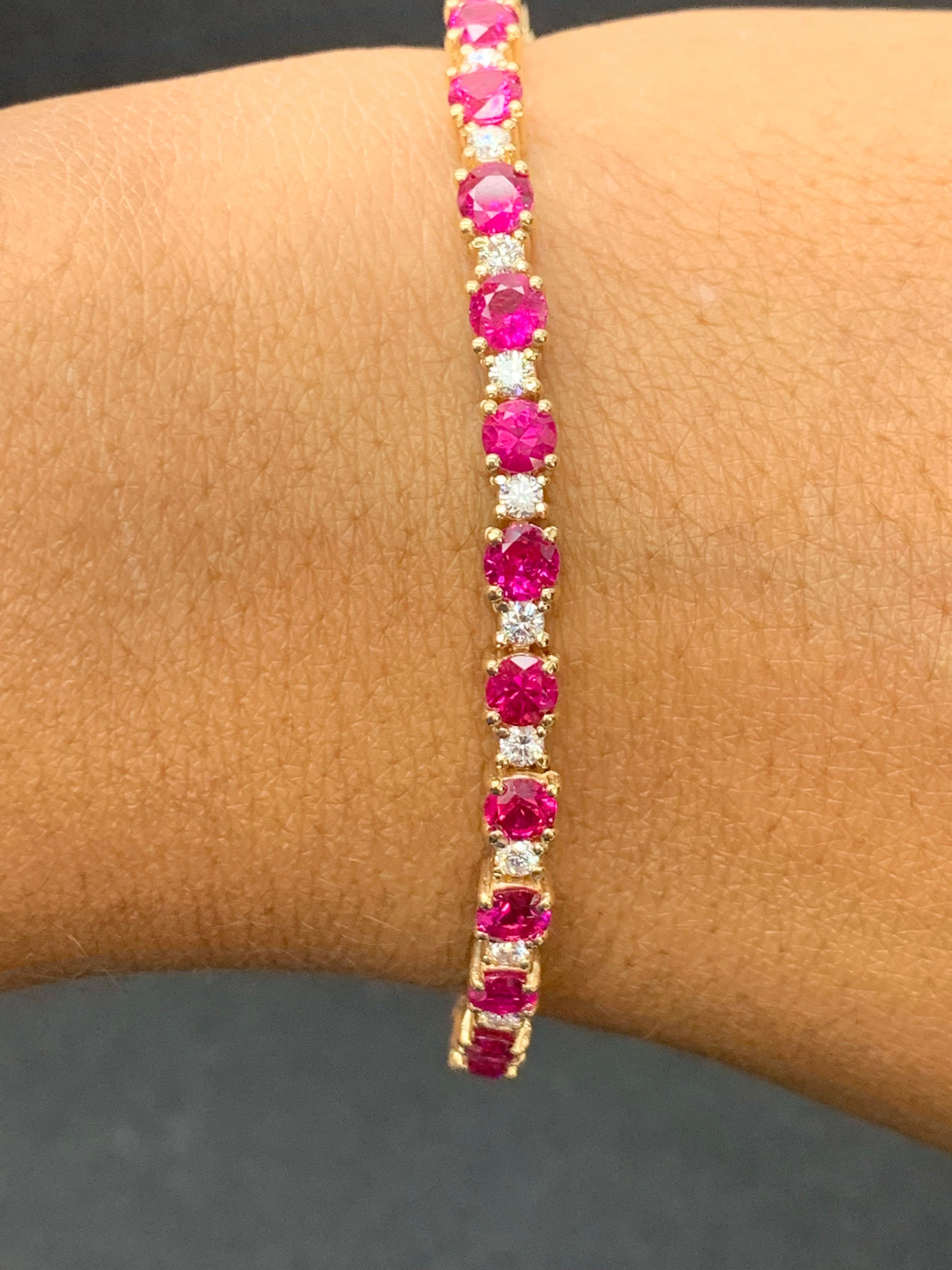 Showcasing 8.70 carats total of 28 red rubies, elegantly alternating with 1.40 carats of 28 round brilliant diamonds. Made in 14 karat yellow gold.

Style available in different price ranges. Prices are based on your selection of the 4C’s (Carat,