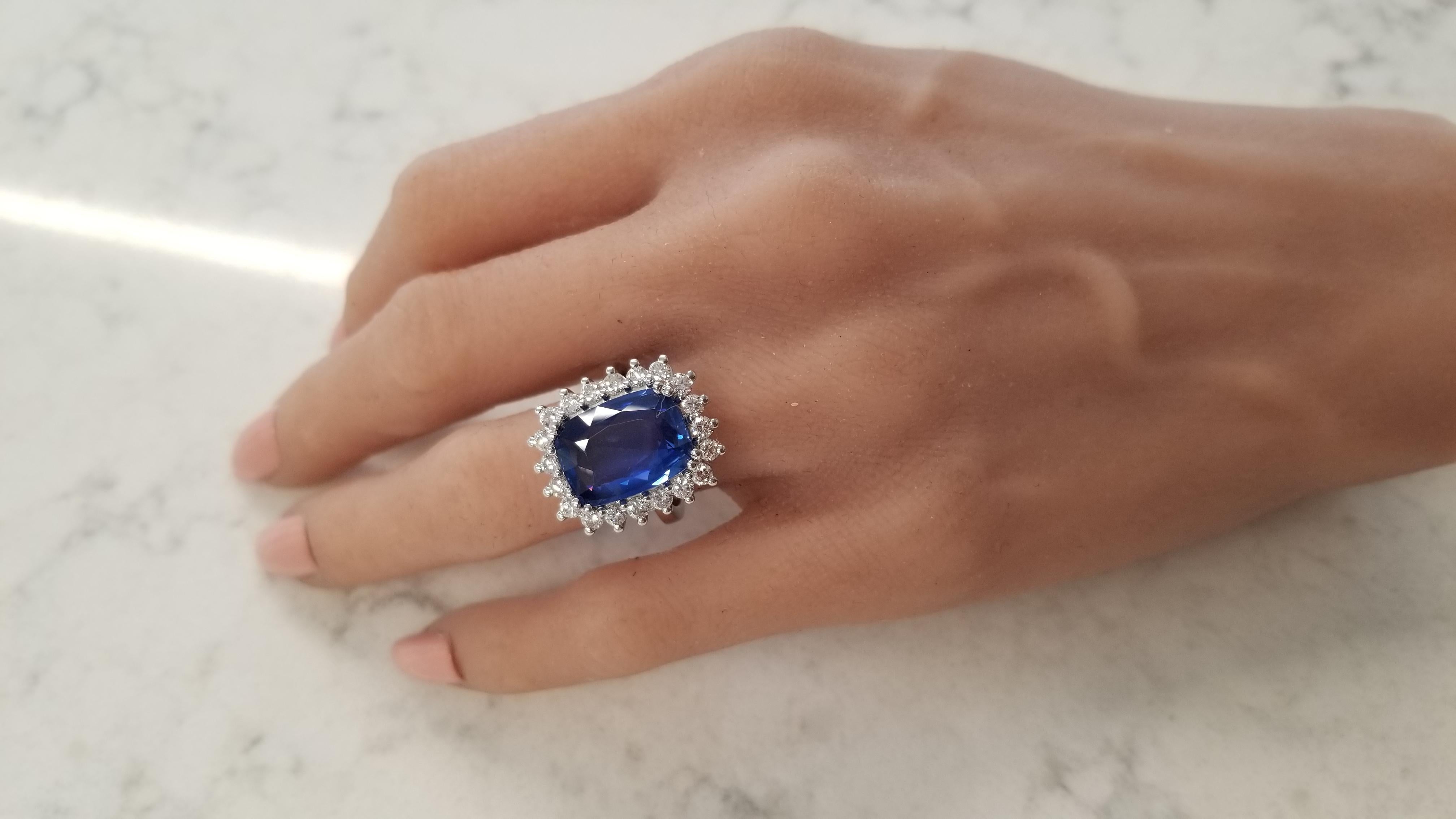 You'll make the statement with this ring that features a GIA certified 8.70 carat elongated cushion cut. Its gem source is Sri Lanka; its color is royal blue with hints of cornflower blue. It measures 14.39 X 10.70mm and has excellent transparency
