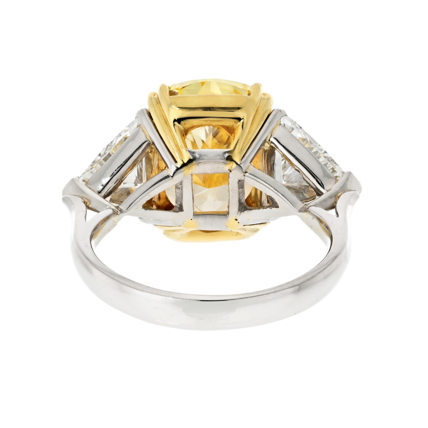 Women's 8.70 Carat Fancy Yellow Intense Cushion Cut VVS2 GIA Three Stone Engagement Ring For Sale