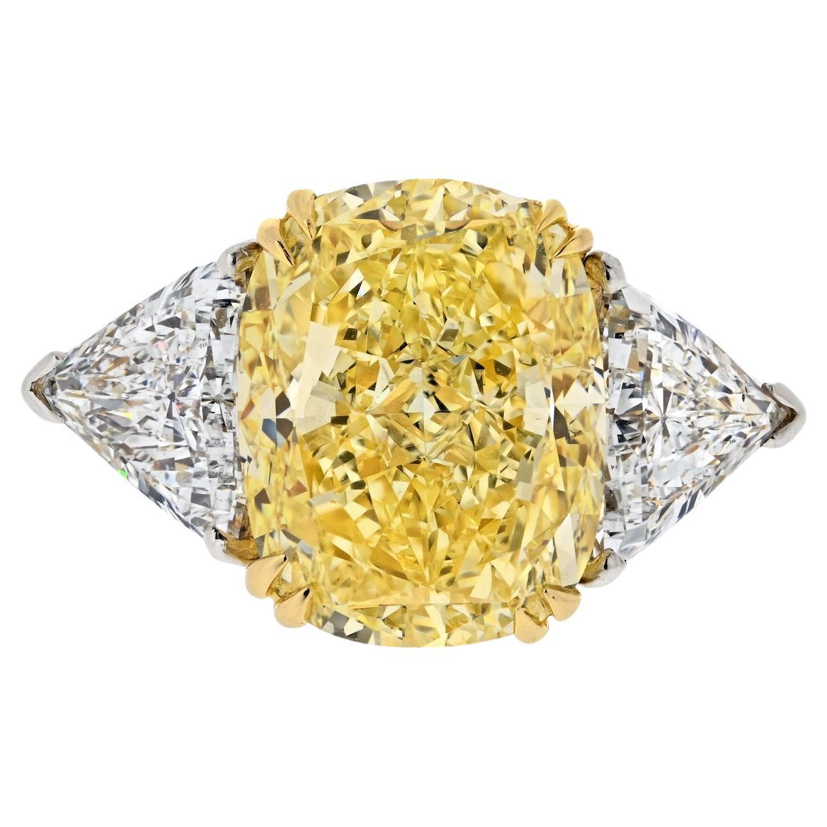 8.70 Carat Fancy Yellow Intense Cushion Cut VVS2 GIA Three Stone Engagement Ring For Sale