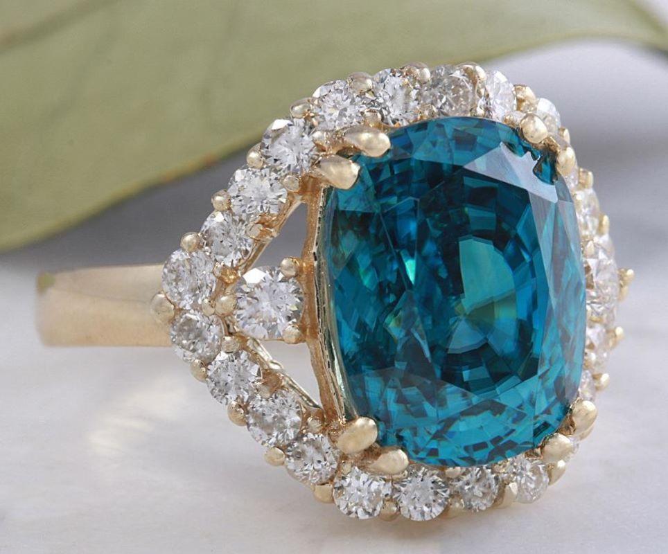 8.70 Carats Natural Very Nice Looking Blue Zircon and Diamond 14K Yellow Gold Ring

Suggested Replacement Value: 9,000.00

Total Natural Cushion Shaped Zircon Weights: Approx. 7.80 Carats

Zircon Measures: 11 x 8.4mm

Natural Round Diamonds Weight:
