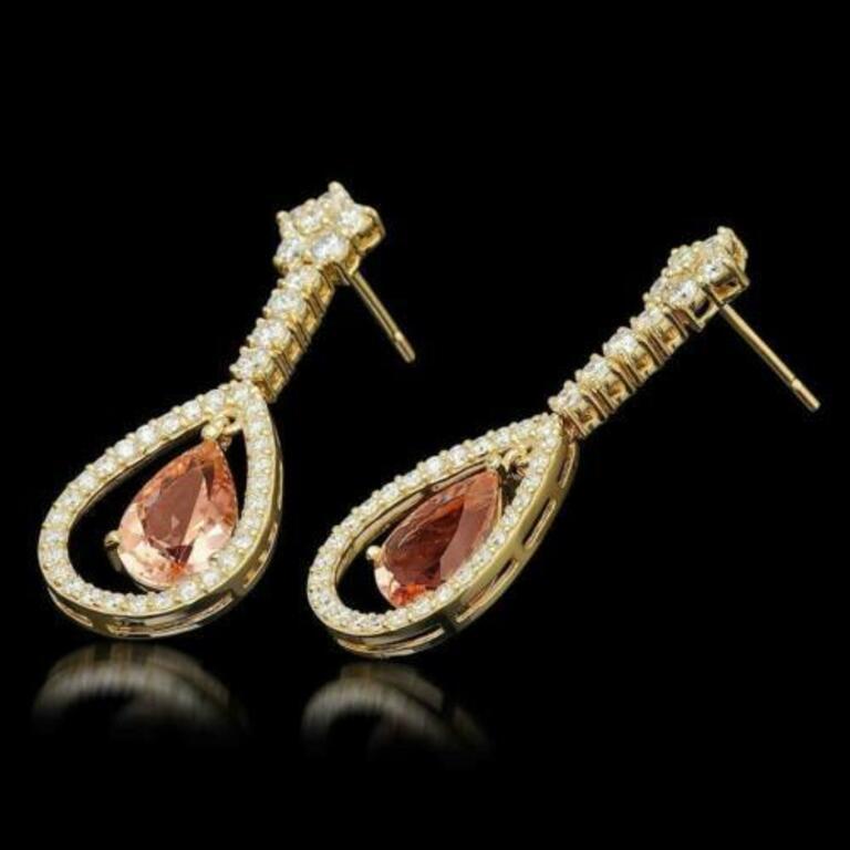 8.70 Carats Natural Morganite and Diamond 14K Yellow Gold Earrings

Amazing looking piece!

Total Natural Round Cut White Diamonds Weight: Approx. 2.70 Carats (color G-H / Clarity SI1-SI2)

Total Natural Pear Shaped Morganite Weigh ist: Approx. 6.00