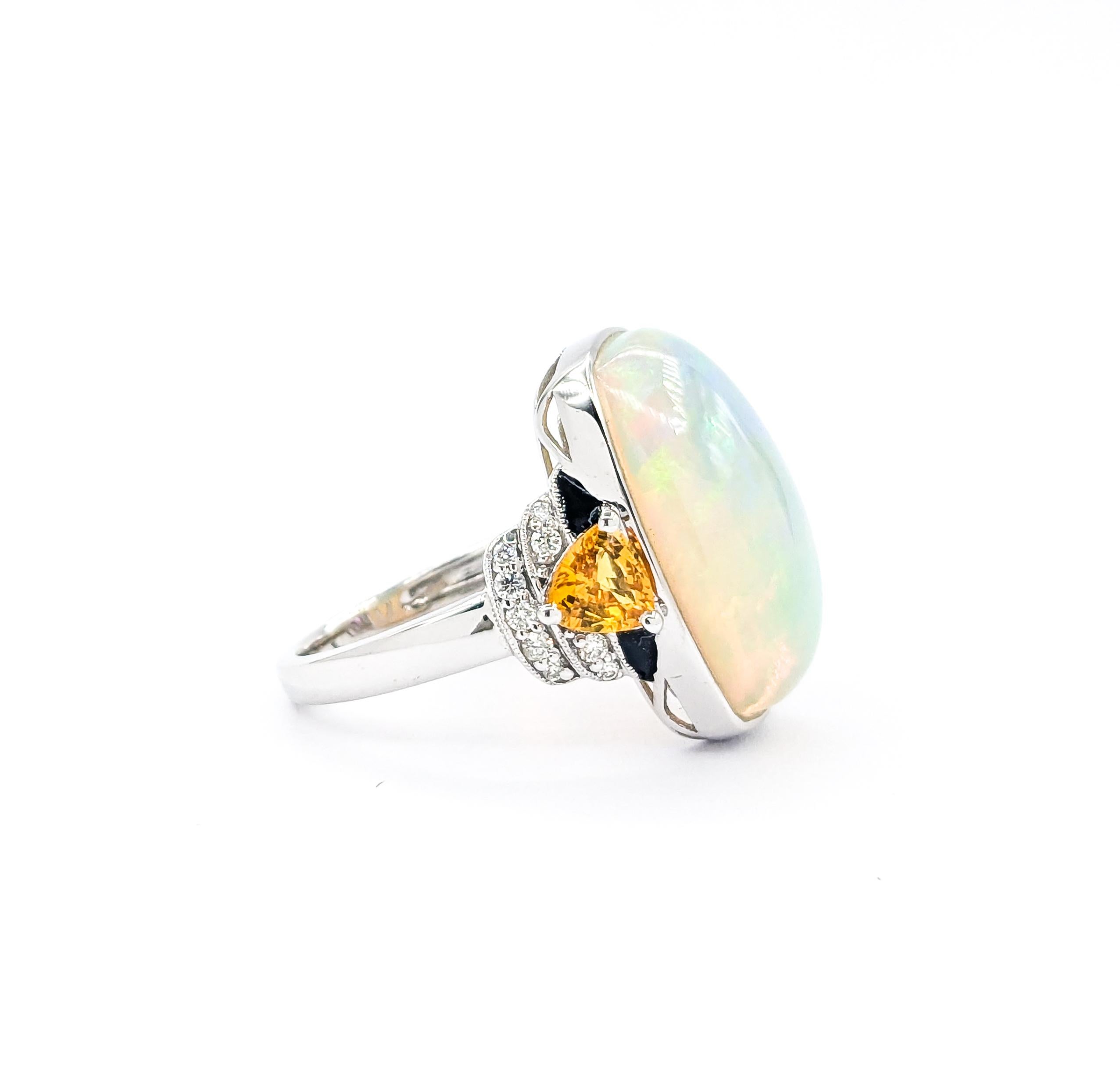 Ring aus Platin mit 8,70 Karat Opal, Cabochon, mehrfarbigem Saphir und Diamant 2